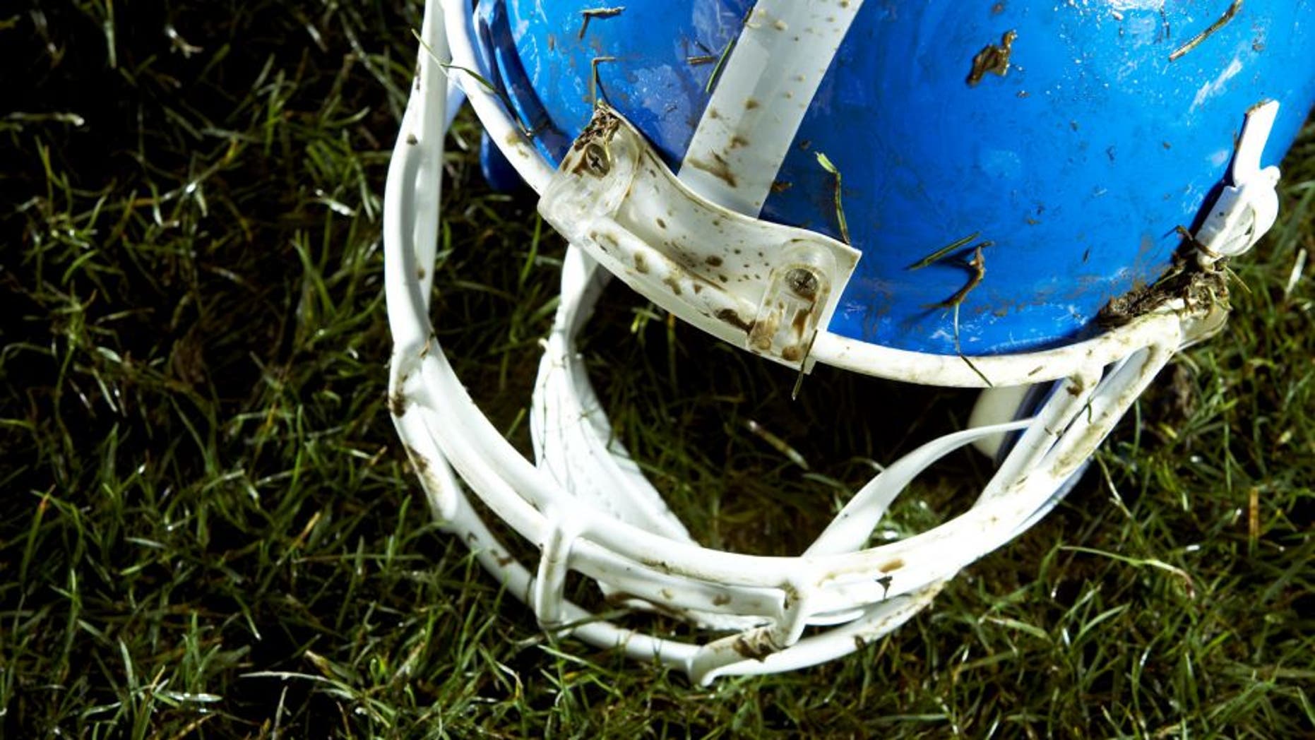 Football helmet on grass