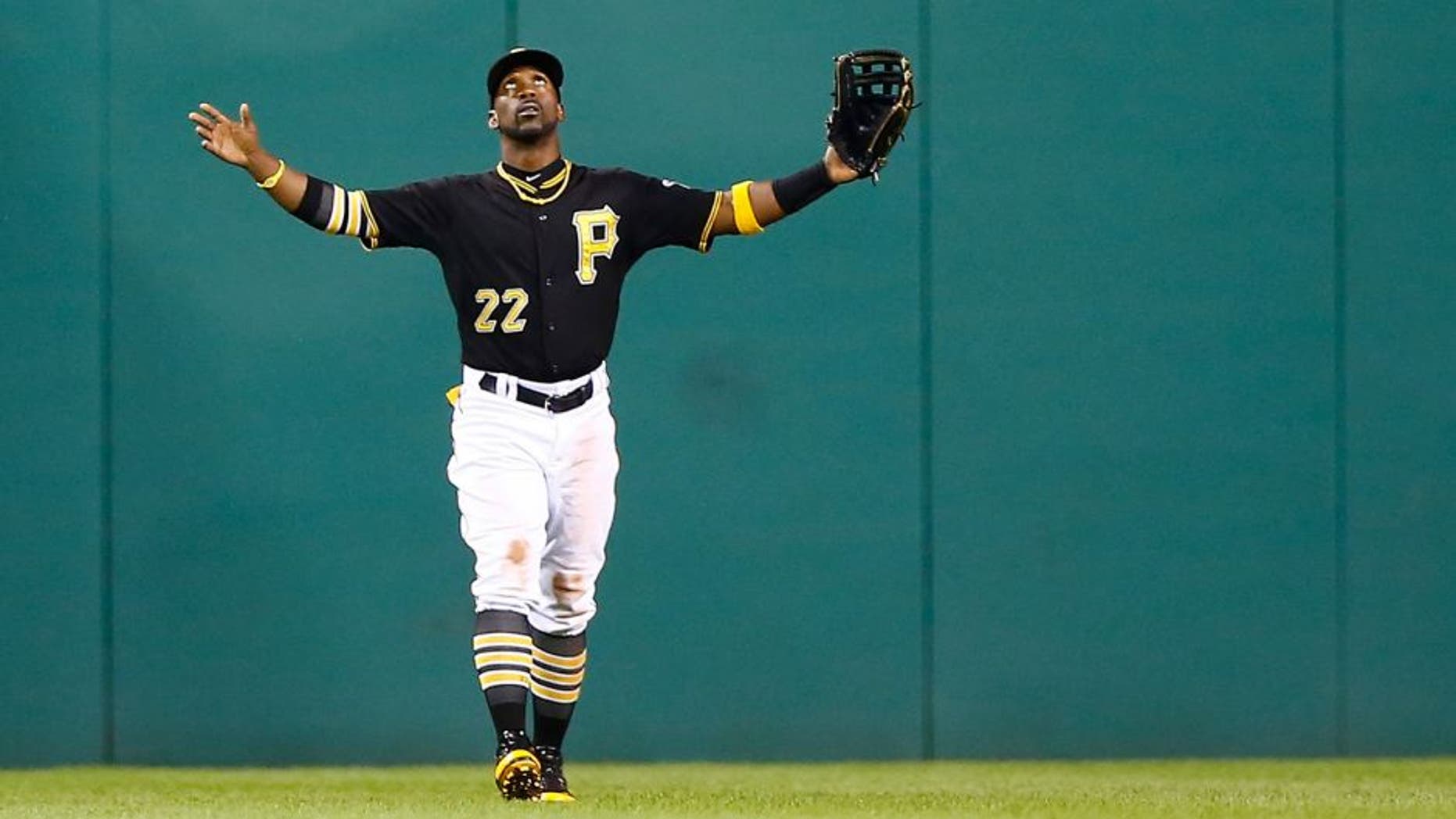 PITTSBURGH, PA - SEPTEMBER 11: Andrew McCutchen #22 of the Pittsburgh Pirates celebrates their 6-3 win against the Milwaukee Brewers during the game at PNC Park on September 11, 2015 in Pittsburgh, Pennsylvania. (Photo by Jared Wickerham/Getty Images)