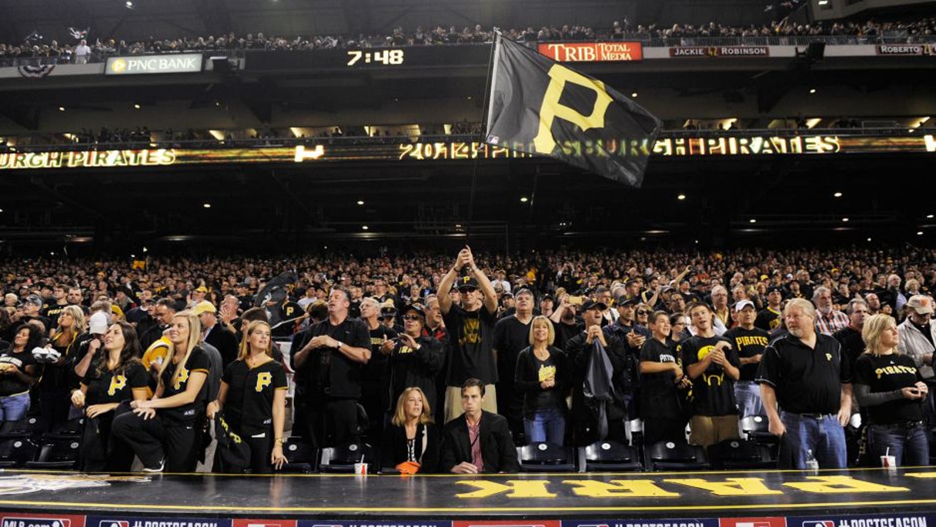 PITTSBURGH, PA - OCTOBER 01: Pittsburgh Pirates fans prepare for their National League Wild Card game against the San Francisco Giants at PNC Park on October 1, 2014 in Pittsburgh, Pennsylvania. (Photo by Jason Miller/Getty Images)