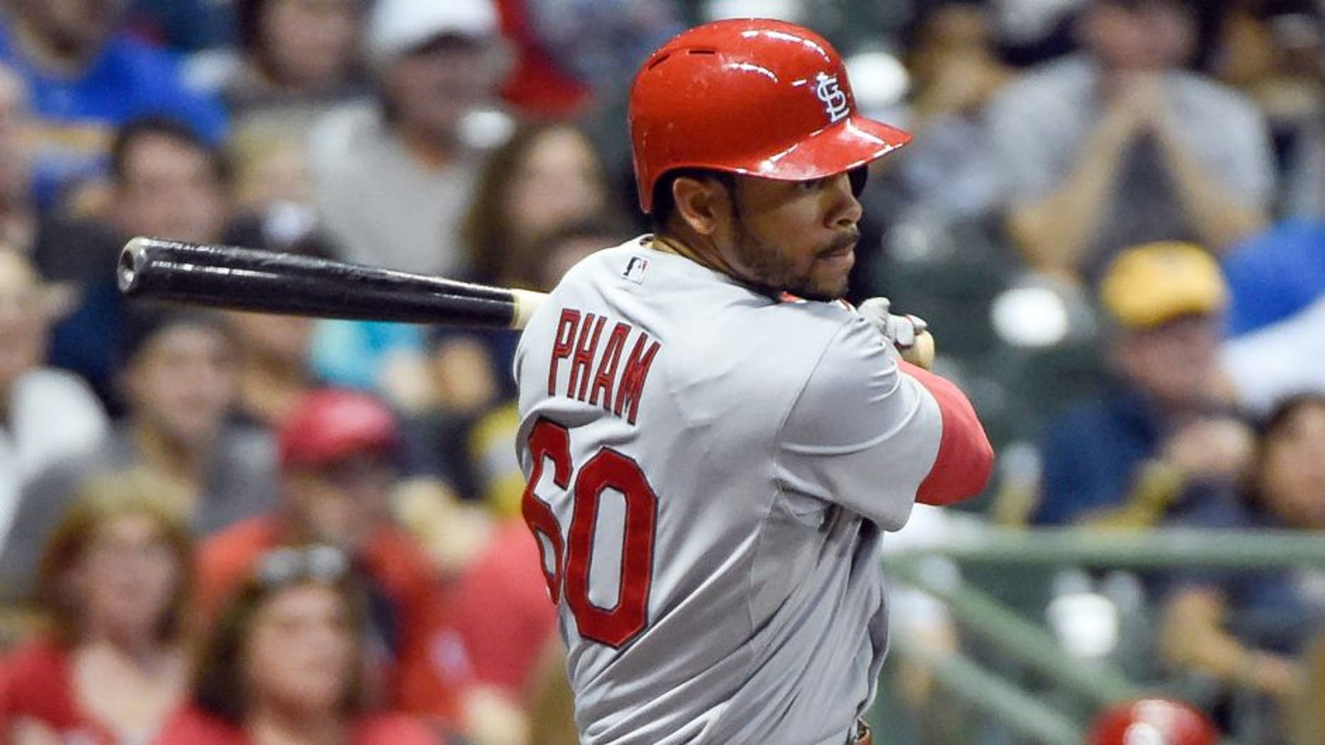 Sep 17, 2015; Milwaukee, WI, USA; St. Louis Cardinals center fielder Thomas Pham (60) drives in a run with a double in the third inning against the Milwaukee Brewers at Miller Park. Mandatory Credit: Benny Sieu-USA TODAY Sports
