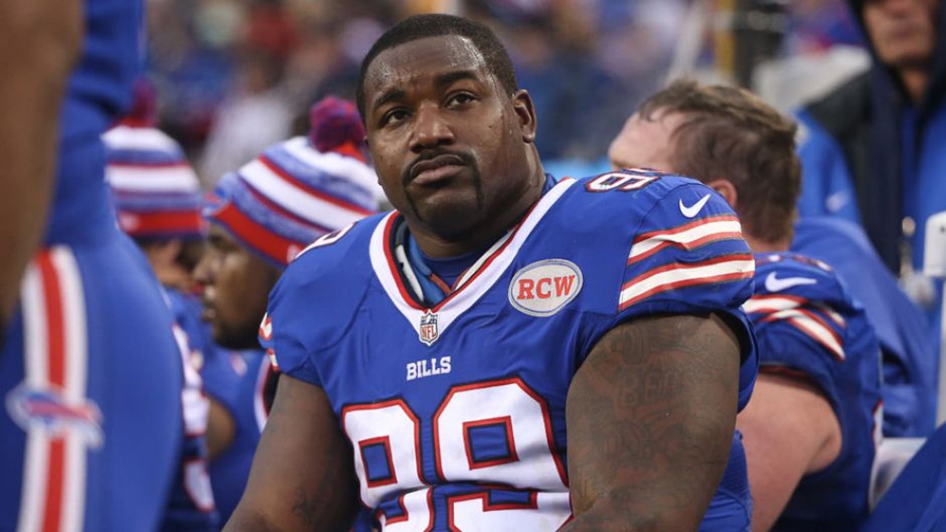 ORCHARD PARK, NY - DECEMBER 14: Marcell Dareus #99 of the Buffalo Bills looks on from the bench during NFL game action against the Green Bay Packers at Ralph Wilson Stadium on December 14, 2014 in Orchard Park, New York. (Photo by Tom Szczerbowski/Getty Images)