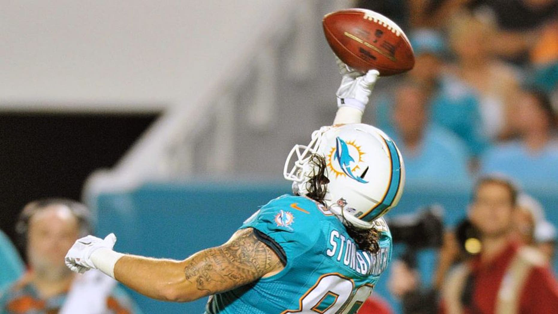 Sep 3, 2015; Miami Gardens, FL, USA; Miami Dolphins tight end Jake Stoneburner (86) is unable to makes a catch during the second half against the Miami Dolphins at Sun Life Stadium. Mandatory Credit: Steve Mitchell-USA TODAY Sports