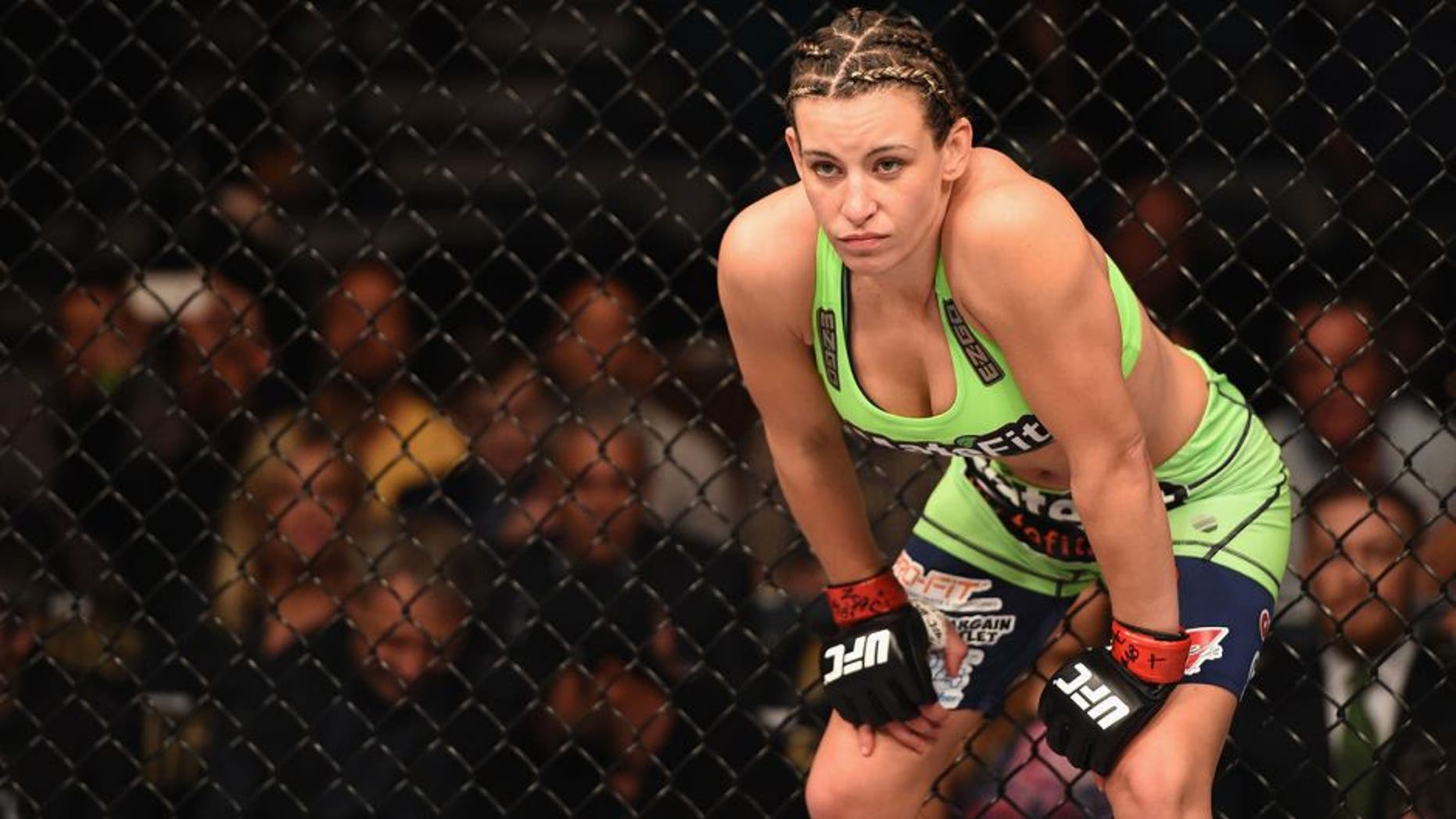 LAS VEGAS, NV - JANUARY 31: Miesha Tate prepares to face Sara McMann in their women's bantamweight bout during the UFC 183 event at the MGM Grand Garden Arena on January 31, 2015 in Las Vegas, Nevada. (Photo by Josh Hedges/Zuffa LLC/Zuffa LLC via Getty Images)