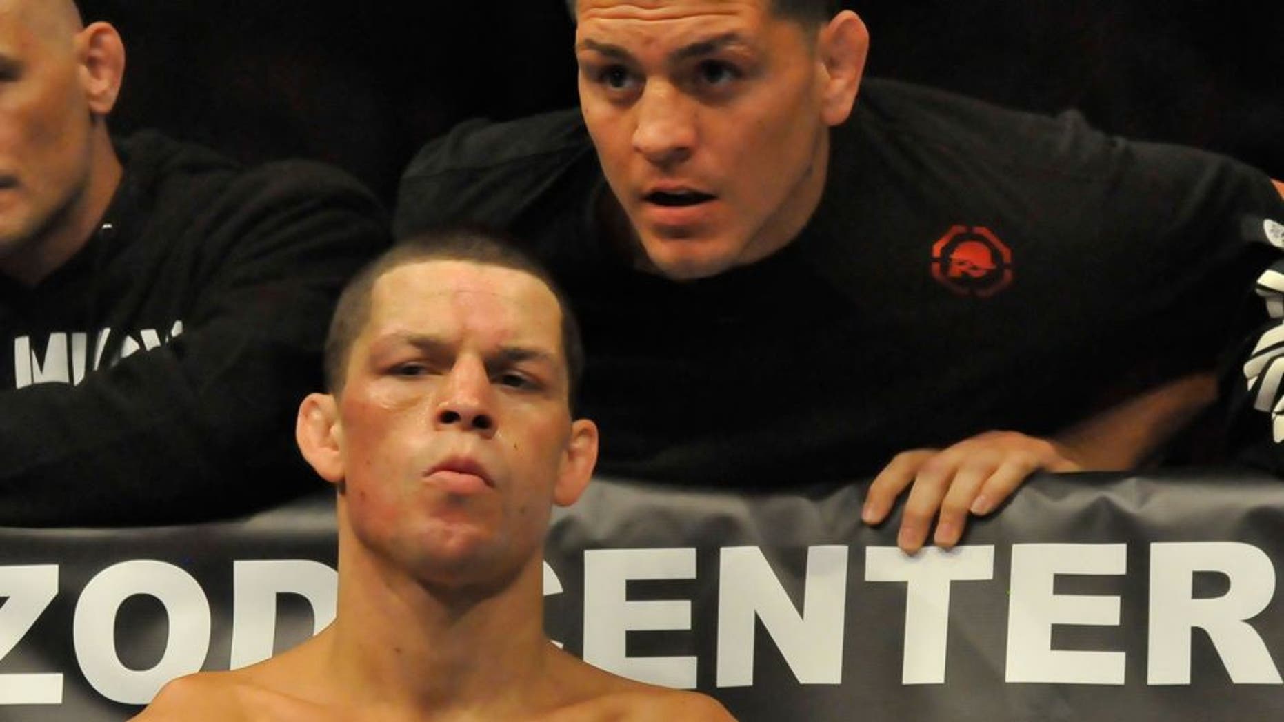 EAST RUTHERFORD, NEW JERSEY - MAY 5, 2012: Nate Diaz receives last second advice from his brother Nick Diaz in his corner before a lightweight bout at Izod Center on May 5, 2012 in East Rutherford, New Jersey. (Photo by David Dermer/Diamond Images/Getty Images)