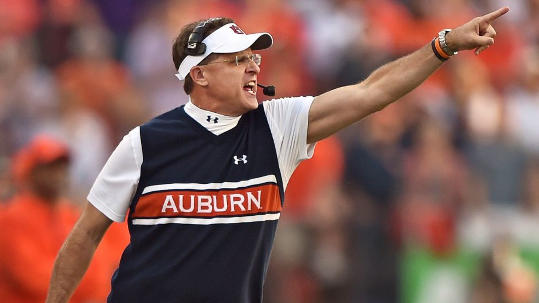MANHATTAN, KS - SEPTEMBER 18: Head coach Gus Malzahn of the Auburn Tigers calls out instructions against the Kansas State Wildcats during the first half on September 18, 2014 at Bill Snyder Family Stadium in Manhattan, Kansas. (Photo by Peter G. Aiken/Getty Images)