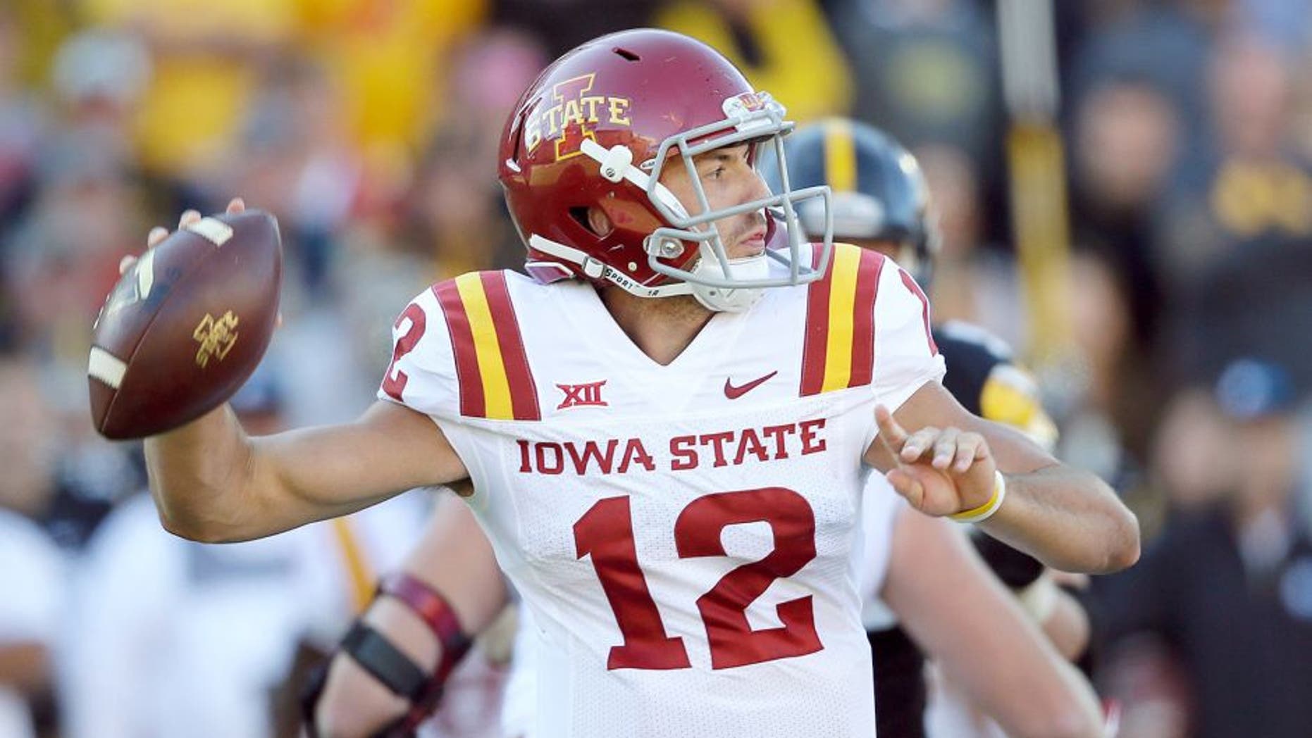 Iowa State quarterback Sam B. Richardson throws a pass during the second half of an NCAA college football game against Iowa, Saturday, Sept. 13, 2014, in Iowa City, Iowa. Iowa State won 20-17. (AP Photo/Charlie Neibergall)