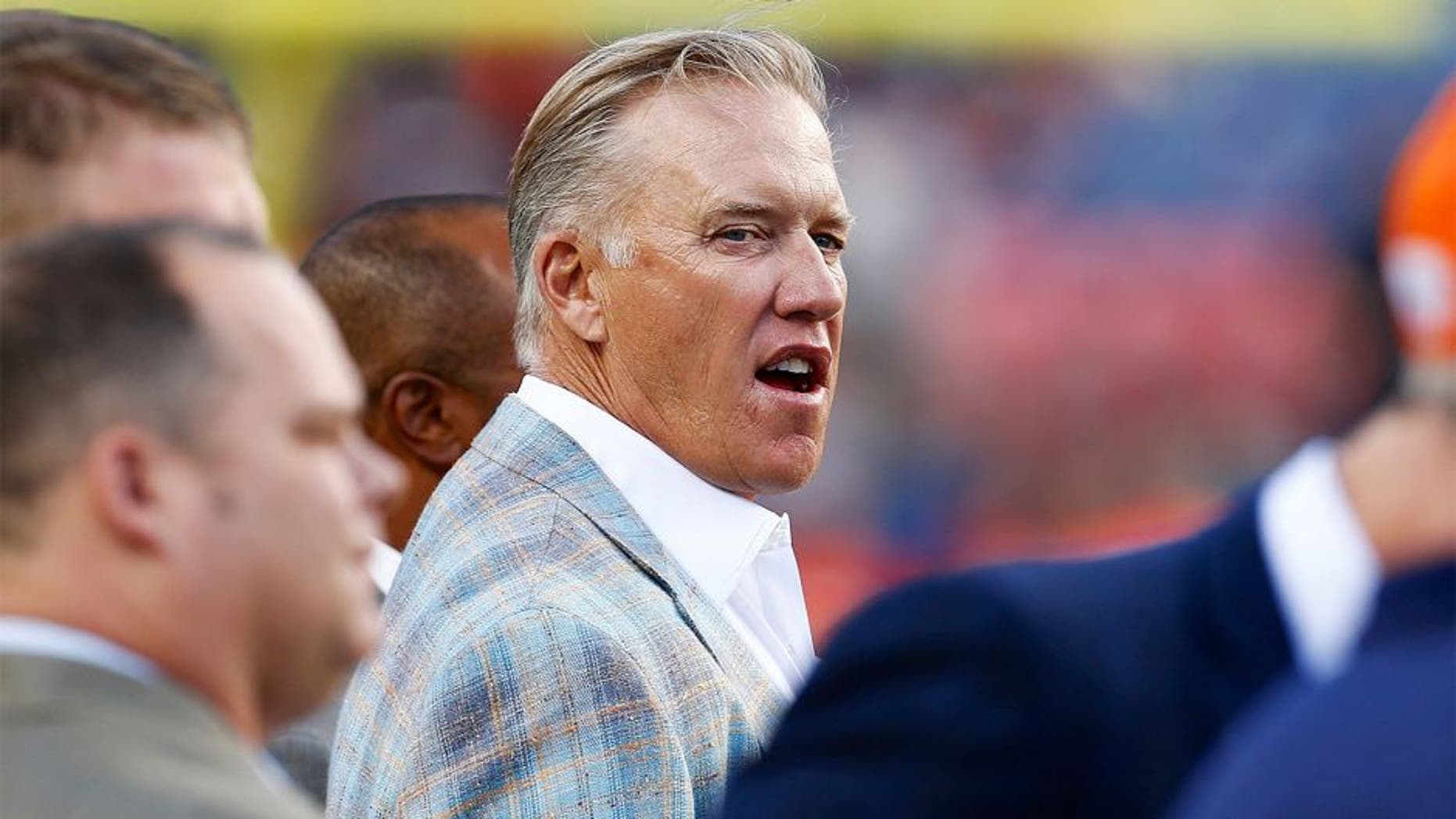 Aug 23, 2014; Denver, CO, USA; Denver Broncos General Manager and executive Vice President of Football operations John Elway watches warmups before the game against the Houston Texans at Sports Authority Field at Mile High. Mandatory Credit: Isaiah J. Downing-USA TODAY Sports