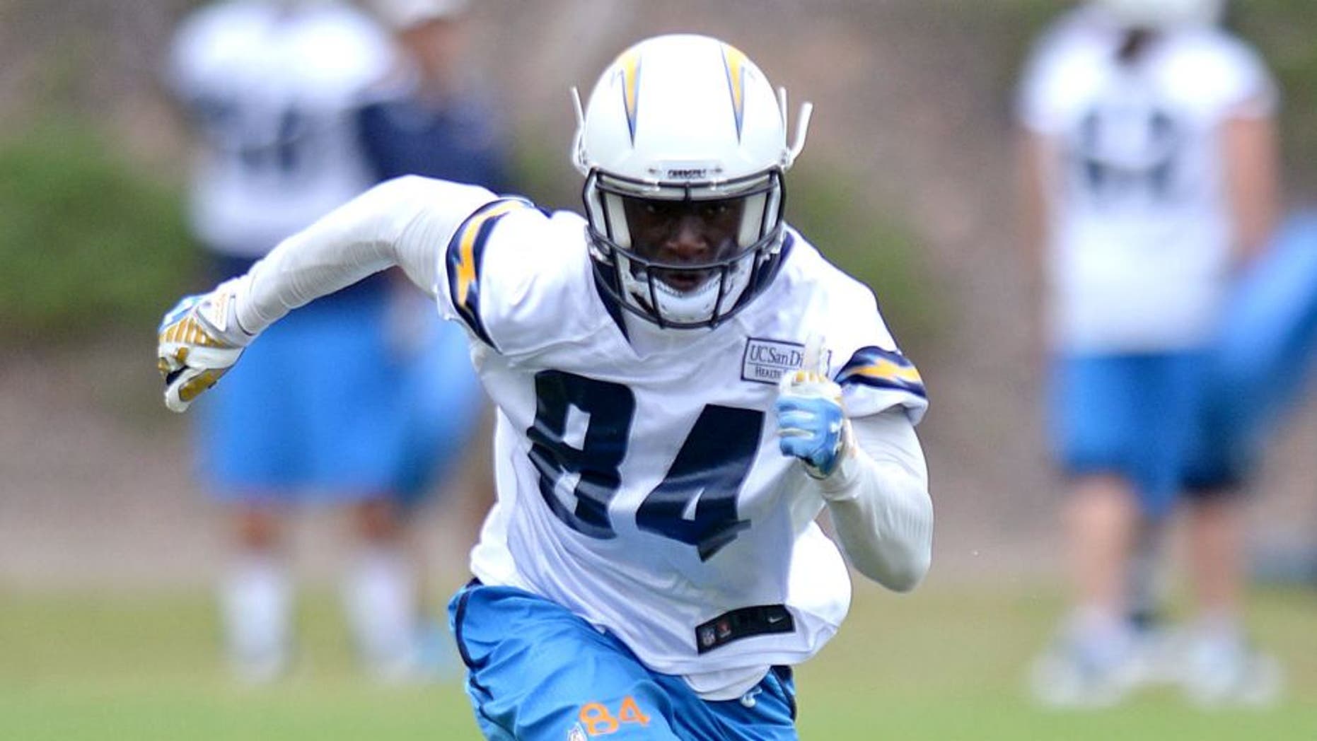 May 26, 2015; San Diego, CA, USA; San Diego Chargers wide receiver Titus Davis (84) runs a route as wide receiver Stevie Johnson (11) looks on during organized team activities at Charger Park. Mandatory Credit: Jake Roth-USA TODAY Sports