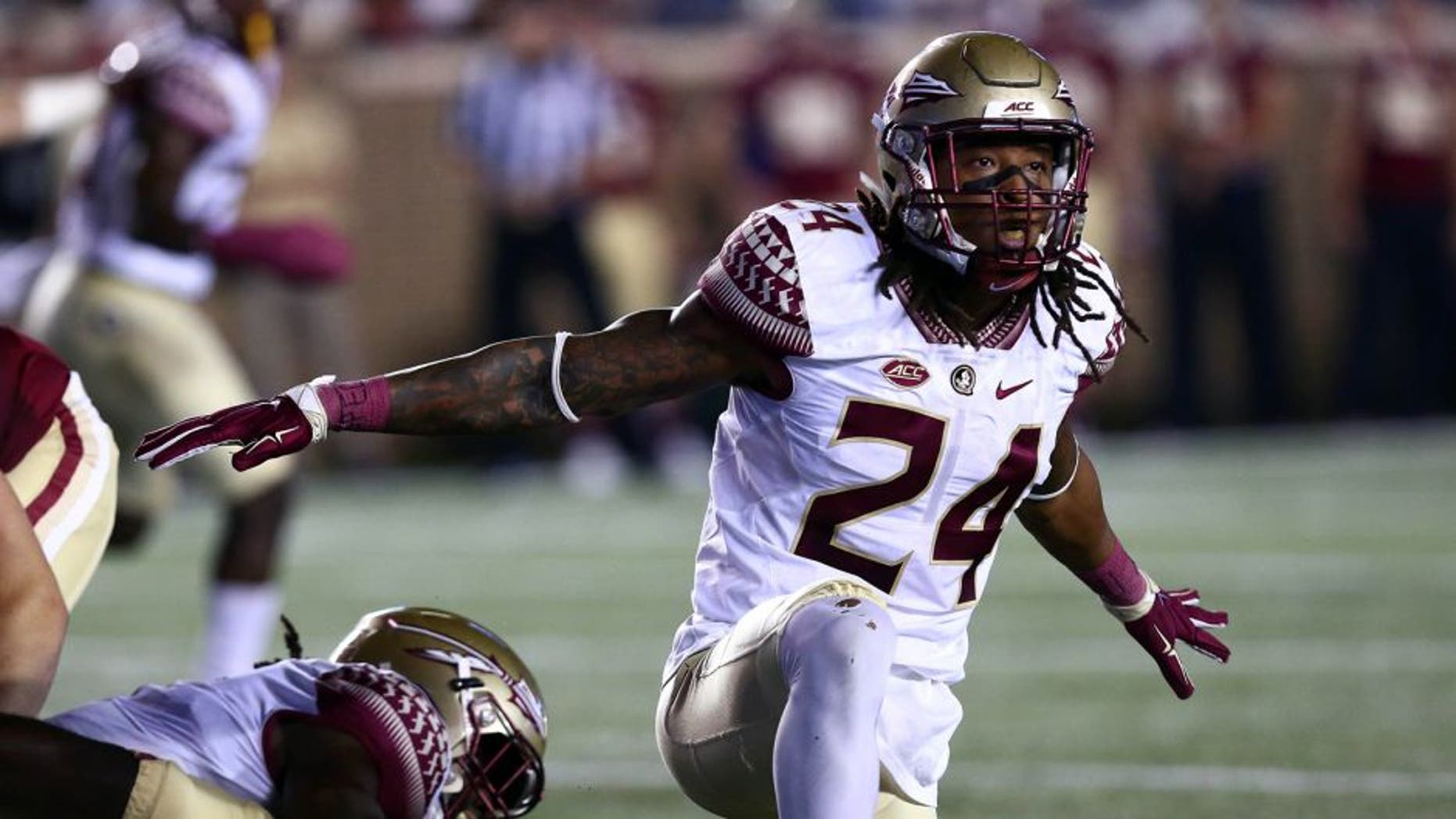 Sep 18, 2015; Boston, MA, USA; Florida State Seminoles linebacker Terrance Smith (24) reacts against the Boston College Eagles during the first half at Alumni Stadium. Mandatory Credit: Mark L. Baer-USA TODAY Sports