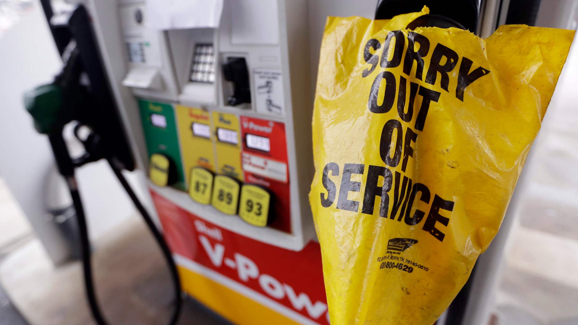 A bag covers a pump handle at a gas station that has no fuel to sell Saturday, Sept. 17, 2016, in Nashville, Tenn.
