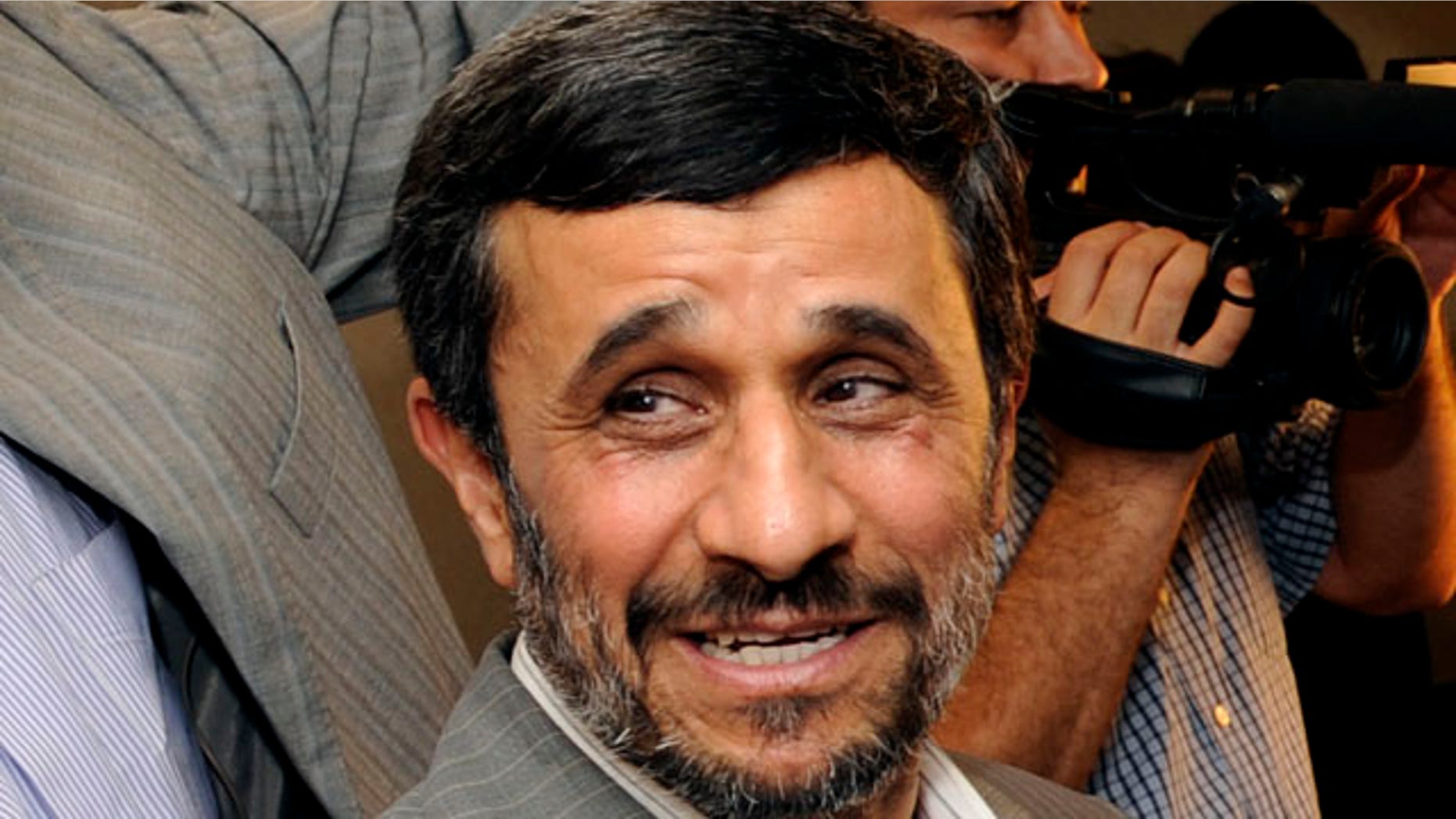 The report specifically names Iranian President Mahmoud Ahmadinejad as a violator of religious freedom. (AP)