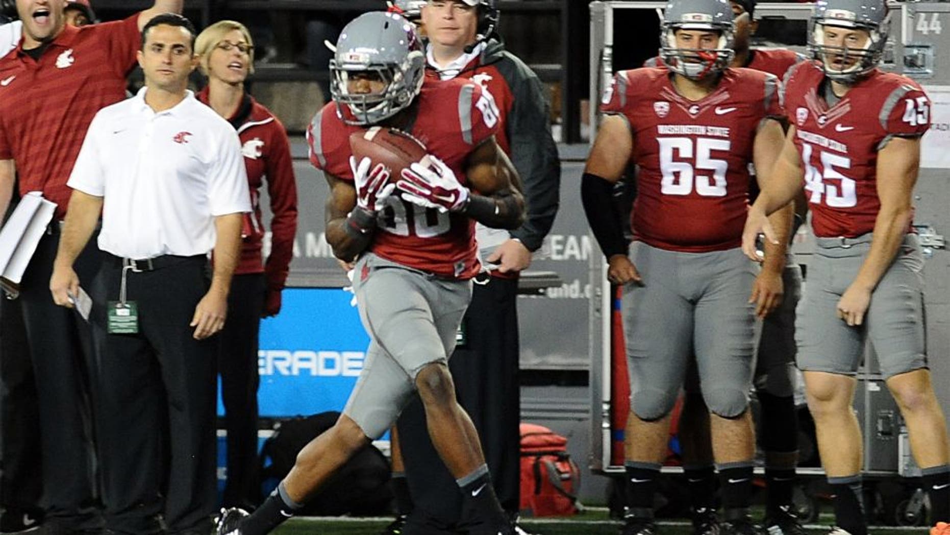 Sep 13, 2014; Pullman, WA, USA; Washington State Cougars wide receiver Dom Williams (80) makes a catch that would turn into a touchdown against the Portland State Vikings during the second half at Martin Stadium. The Cougar beat Vikings 59-21. Mandatory Credit: James Snook-USA TODAY Sports