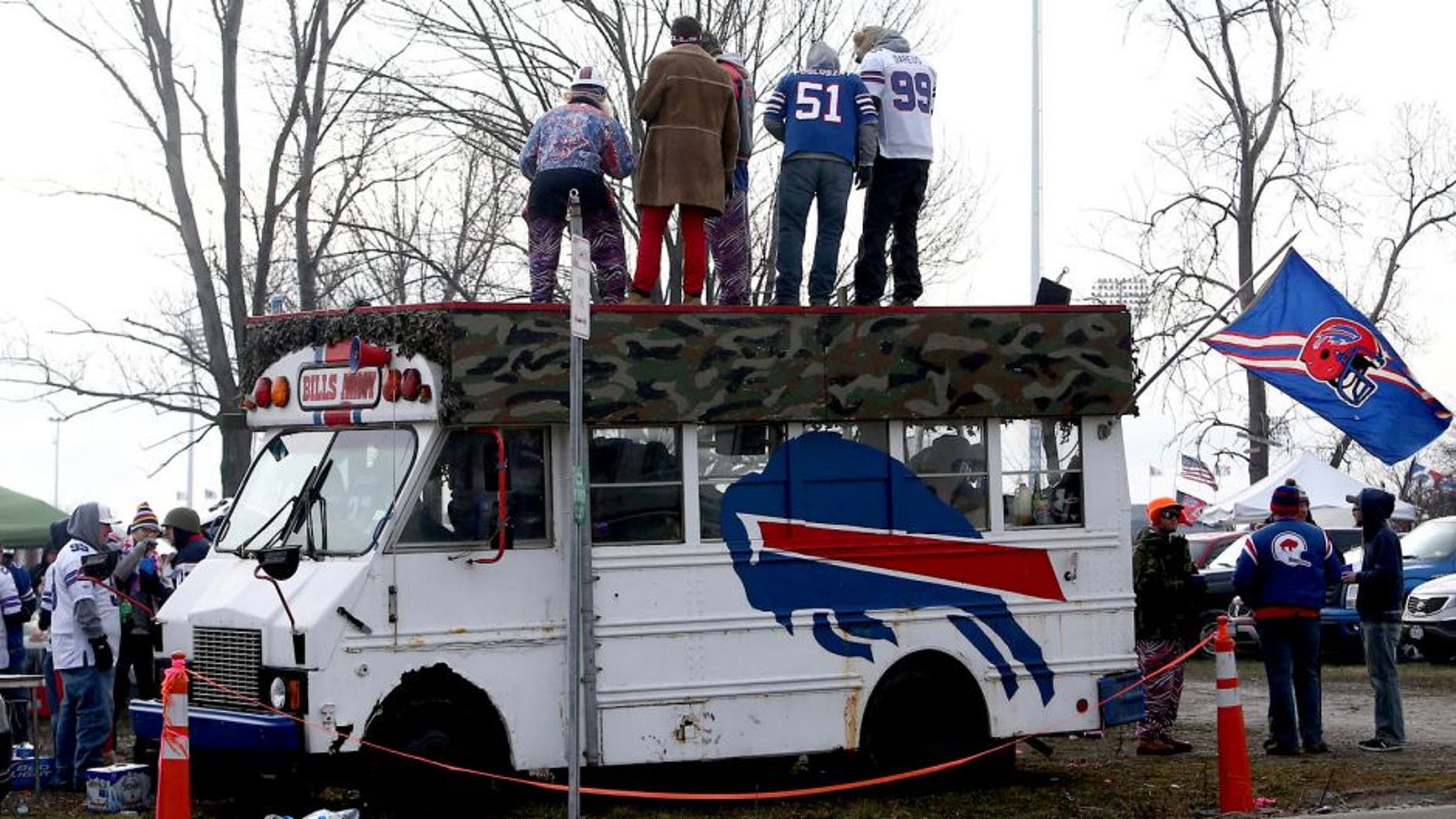 ORCHARD PARK, NY - DECEMBER 9: Fans of the Buffalo Bills take part in tailgating activities before an NFL game against the St. Louis Rams at Ralph Wilson Stadium on December 9, 2012 in Orchard Park, New York. (Photo by Tom Szczerbowski/Getty Images)