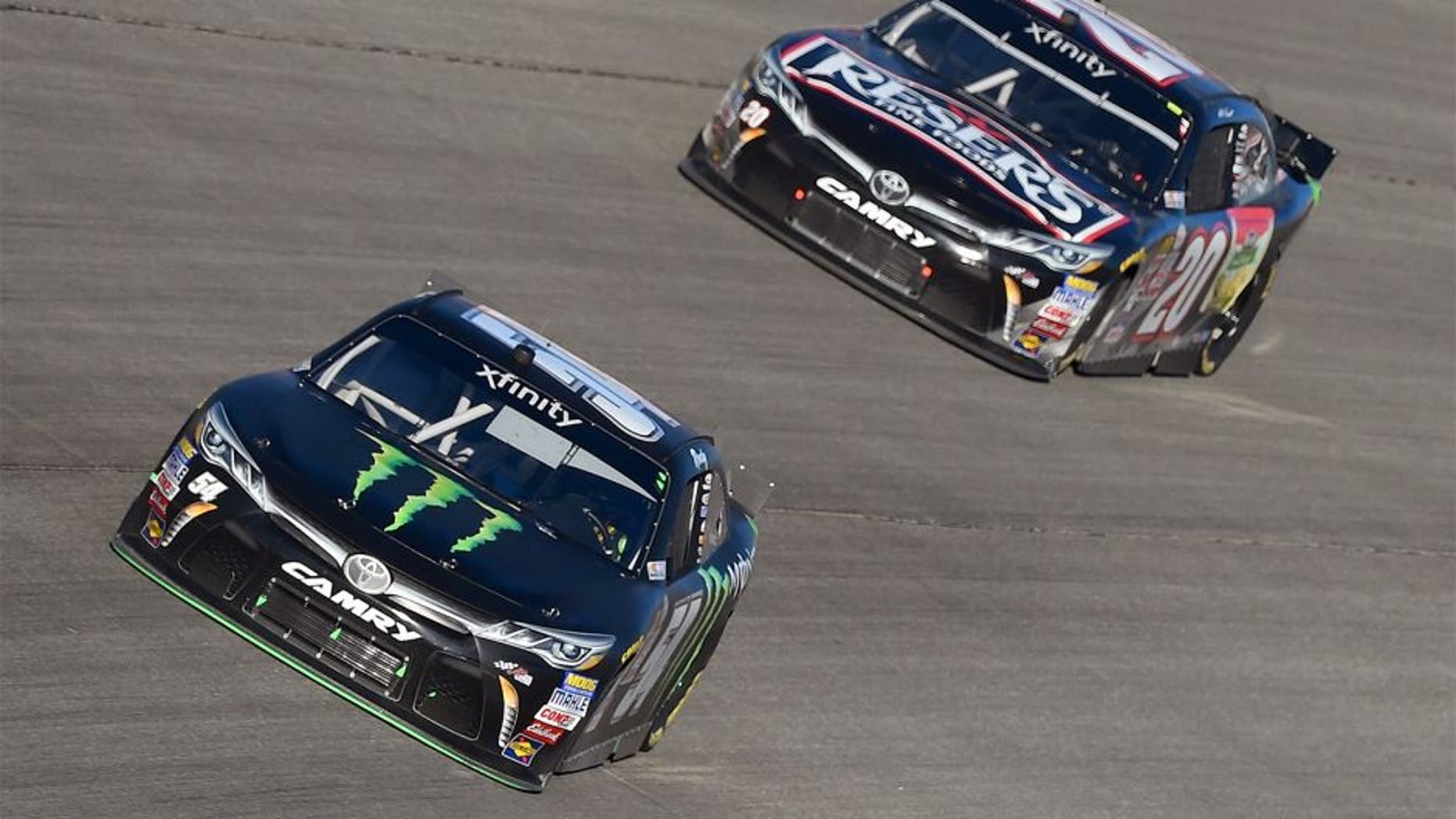 JOLIET, IL - SEPTEMBER 19: Kyle Busch, driver of the #54 Monster Energy Toyota, leads Matt Kenseth, driver of the #20 Reser's Main Street Toyota, during the NASCAR XFINITY Series FURIOUS 7 300 at Chicagoland Speedway on September 19, 2015 in Joliet, Illinois. (Photo by Josh Hedges/Getty Images)