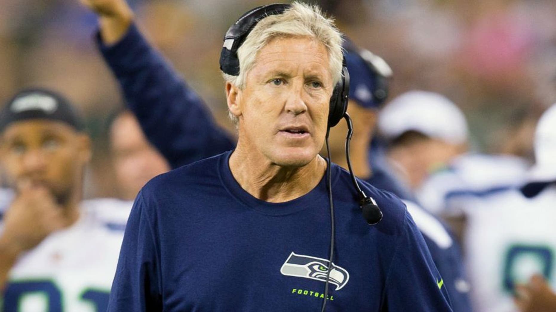 Aug 23, 2013; Green Bay, WI, USA; Seattle Seahawks head coach Pete Carroll during the game against the Green Bay Packers at Lambeau Field. Seattle won 17-10. Mandatory Credit: Jeff Hanisch-USA TODAY Sports