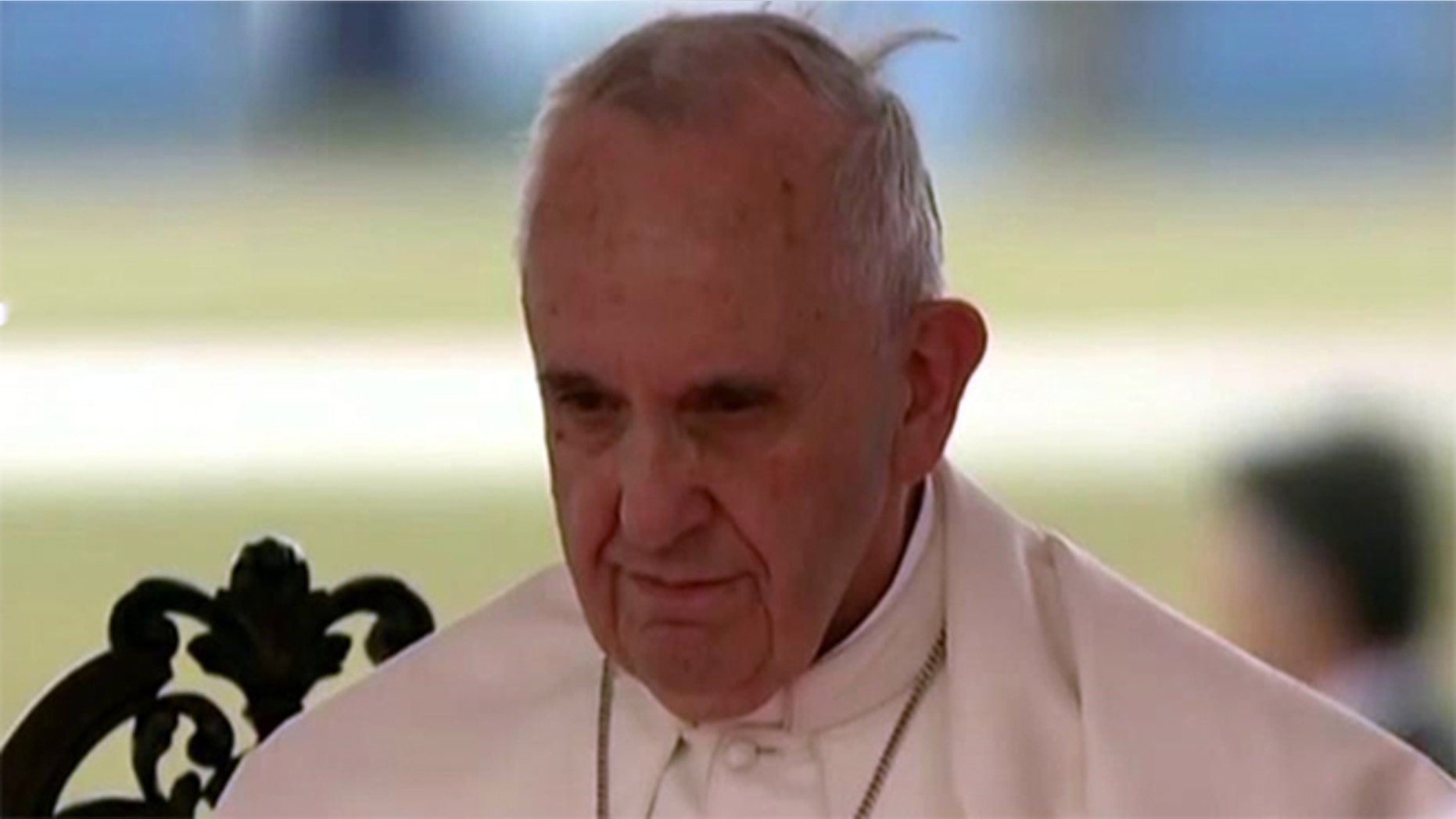 Pope Francis stands beside Cuban leader Raul Castro (not pictured) after arriving in Havana on Saturday September 19, 2015.
