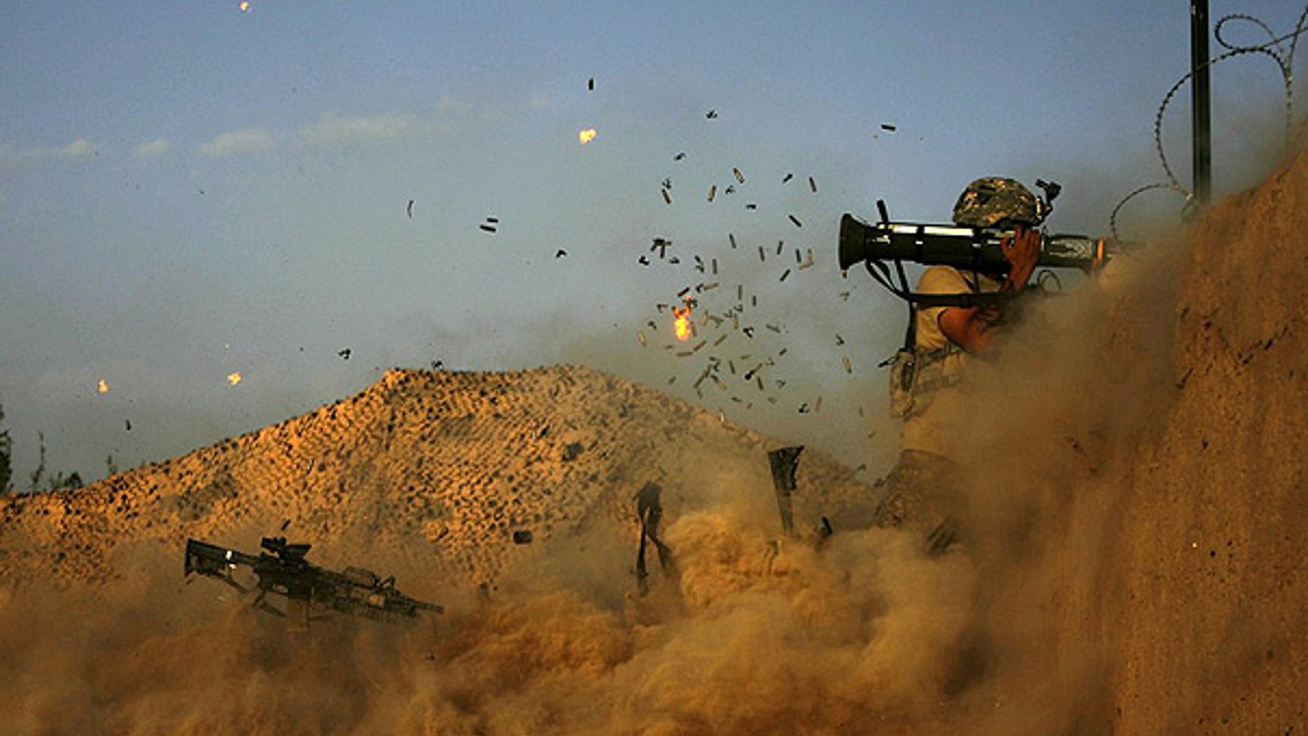Sept. 11: A U.S. army soldier comes under Taliban attack in the Arghandab Valley of Afghanistan.