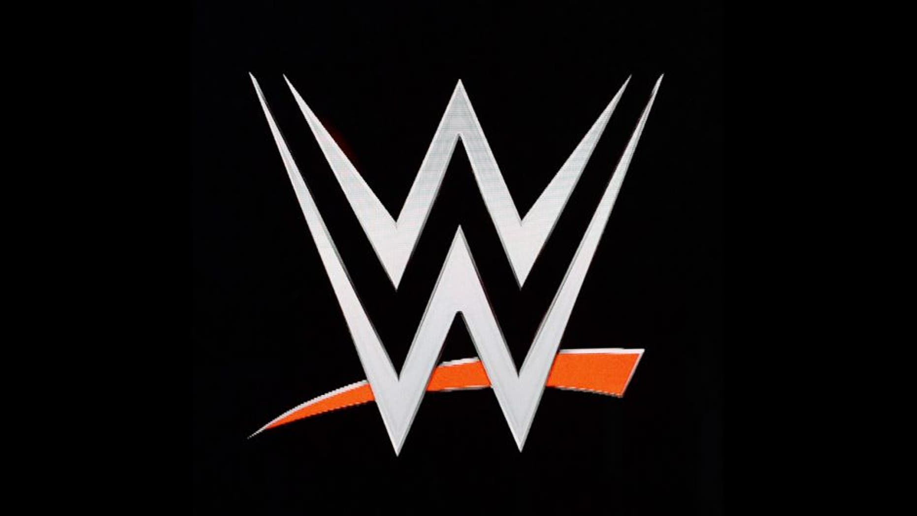 LAS VEGAS, NV - JANUARY 08: The logo for the WWE Network is displayed on a screen after it was announced during a news conference at the 2014 International CES at the Encore Theater at Wynn Las Vegas on January 8, 2014 in Las Vegas, Nevada. The network will launch on February 24, 2014 as the first-ever 24/7 streaming network, offering both scheduled programs and video on demand. The USD 9.99 per month subscription will include access to all 12 live WWE pay-per-view events each year. CES, the world's largest annual consumer technology trade show, runs through January 10 and is expected to feature 3,200 exhibitors showing off their latest products and services to about 150,000 attendees. (Photo by Ethan Miller/Getty Images)