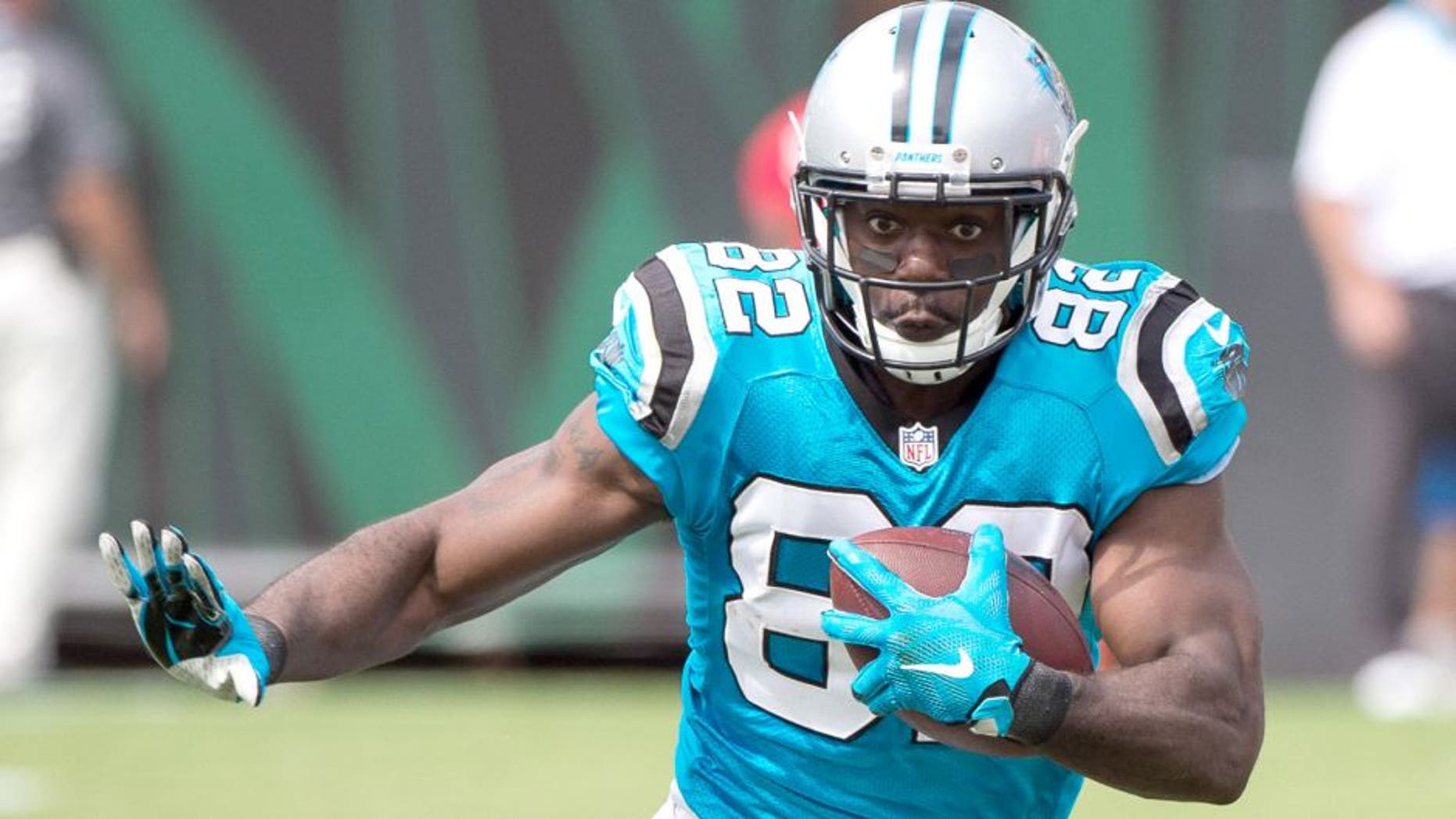 Sep 13, 2015; Jacksonville, FL, USA; Carolina Panthers wide receiver Jerricho Cotchery (82) runs with the ball during the game against the Jacksonville Jaguars at EverBank Field. The Panthers defeat the Jaguars 20-9. Mandatory Credit: Jerome Miron-USA TODAY Sports