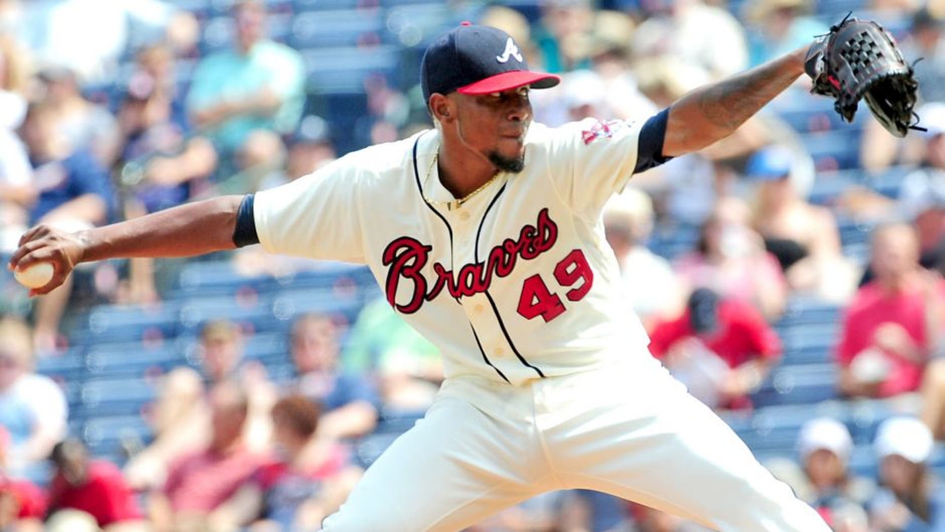 ATLANTA, GA - SEPTEMBER 20: Julio Teheran #49 of the Atlanta Braves throws a second inning pitch against the Philadelphia Philiies at Turner Field on September 20, 2015 in Atlanta, Georgia. (Photo by Scott Cunningham/Getty Images)