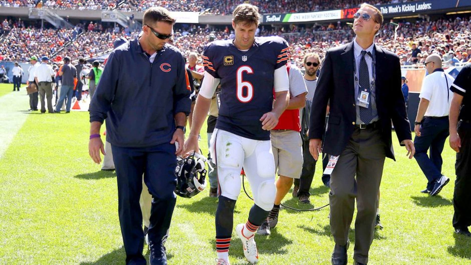Sep 20, 2015; Chicago, IL, USA; Chicago Bears quarterback Jay Cutler (6) walks off the field after an apparent injury during the first half against the Arizona Cardinals at Soldier Field. Mandatory Credit: Dennis Wierzbicki-USA TODAY Sports