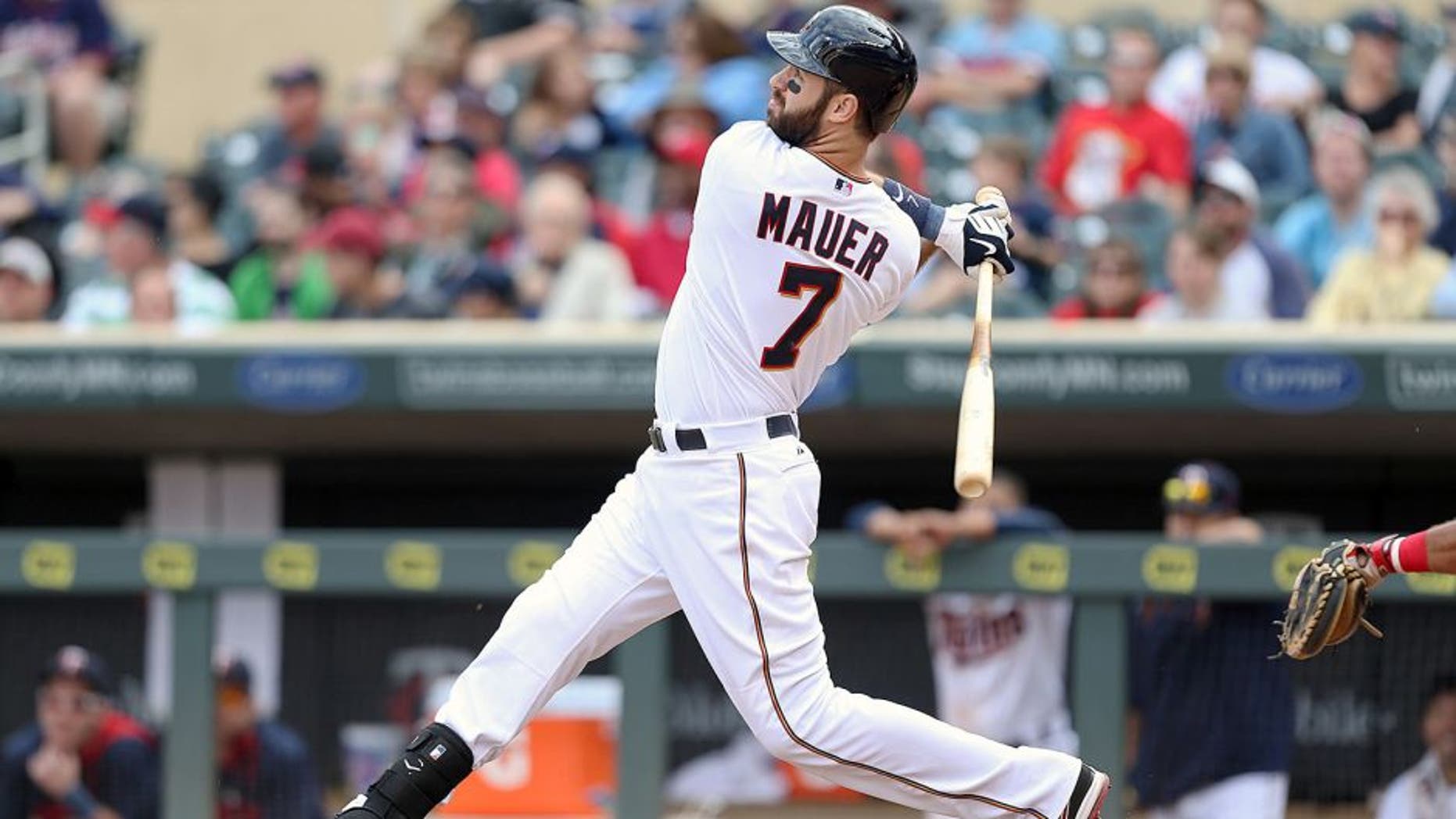MINNEAPOLIS, MN - SEPTEMBER 20: Joe Mauer #7 of the Minnesota Twins hits a solo home run in the 8th inning against the Los Angeles Angels of Anaheim at Target Field on September 20, 2015 in Minneapolis, Minnesota. The Twins defeated the Angels 8-1. (Photo by David Sherman/Getty Images)