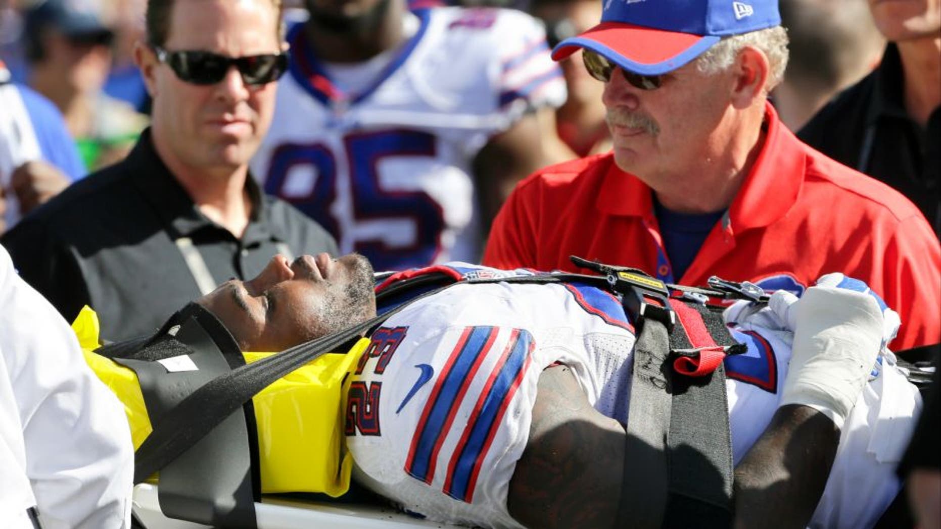 Buffalo Bills free safety Aaron Williams (23) is carted off the field during the second half of an NFL football game against the New England Patriots Sunday, Sept. 20, 2015, in Orchard Park, N.Y. (AP Photo/Bill Wippert)