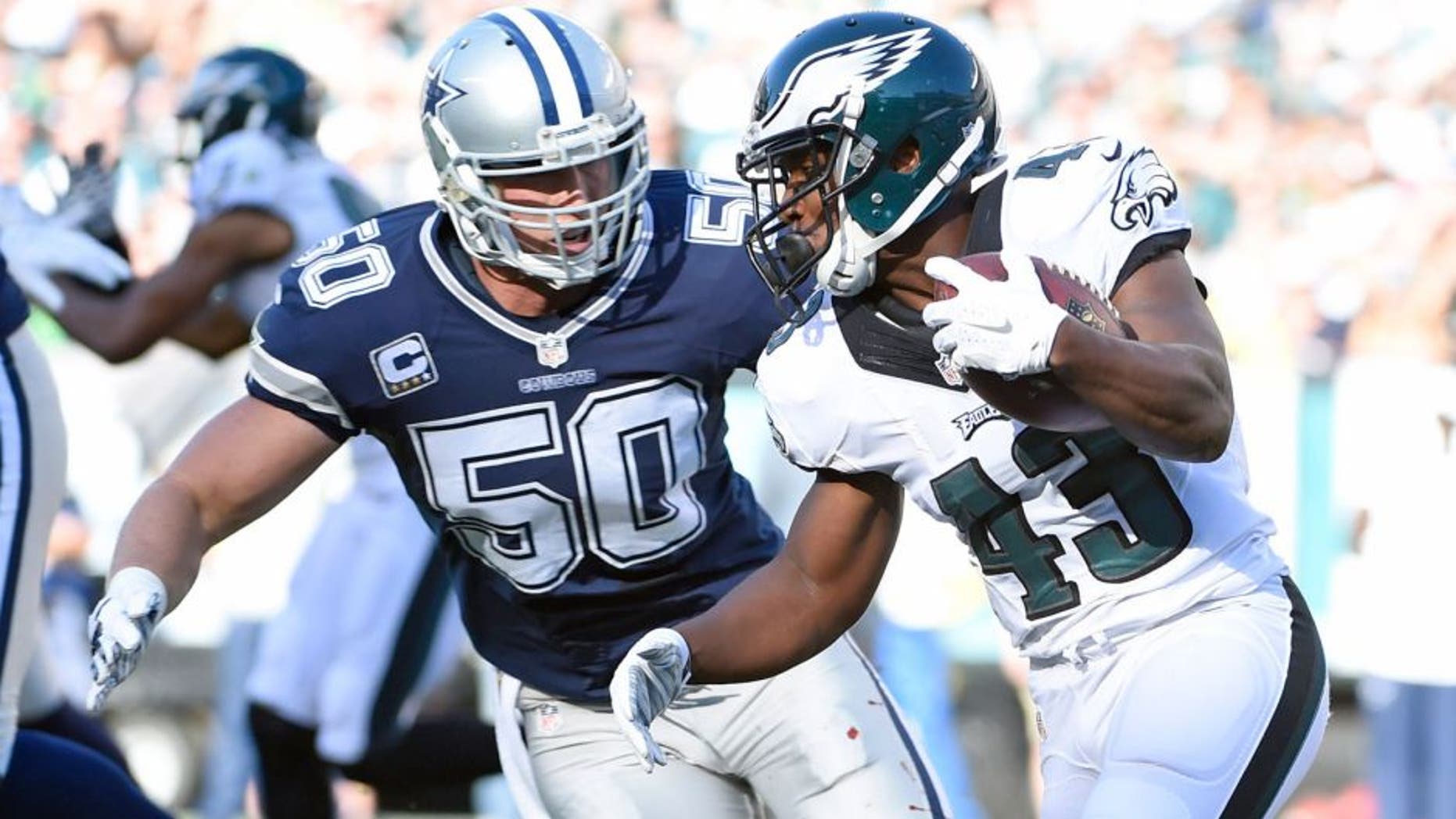 Sep 20, 2015; Philadelphia, PA, USA; Dallas Cowboys outside linebacker Sean Lee (50) closes in to make a tackle on Philadelphia Eagles running back Darren Sproles (43) during the first quarter at Lincoln Financial Field. Mandatory Credit: Eric Hartline-USA TODAY Sports