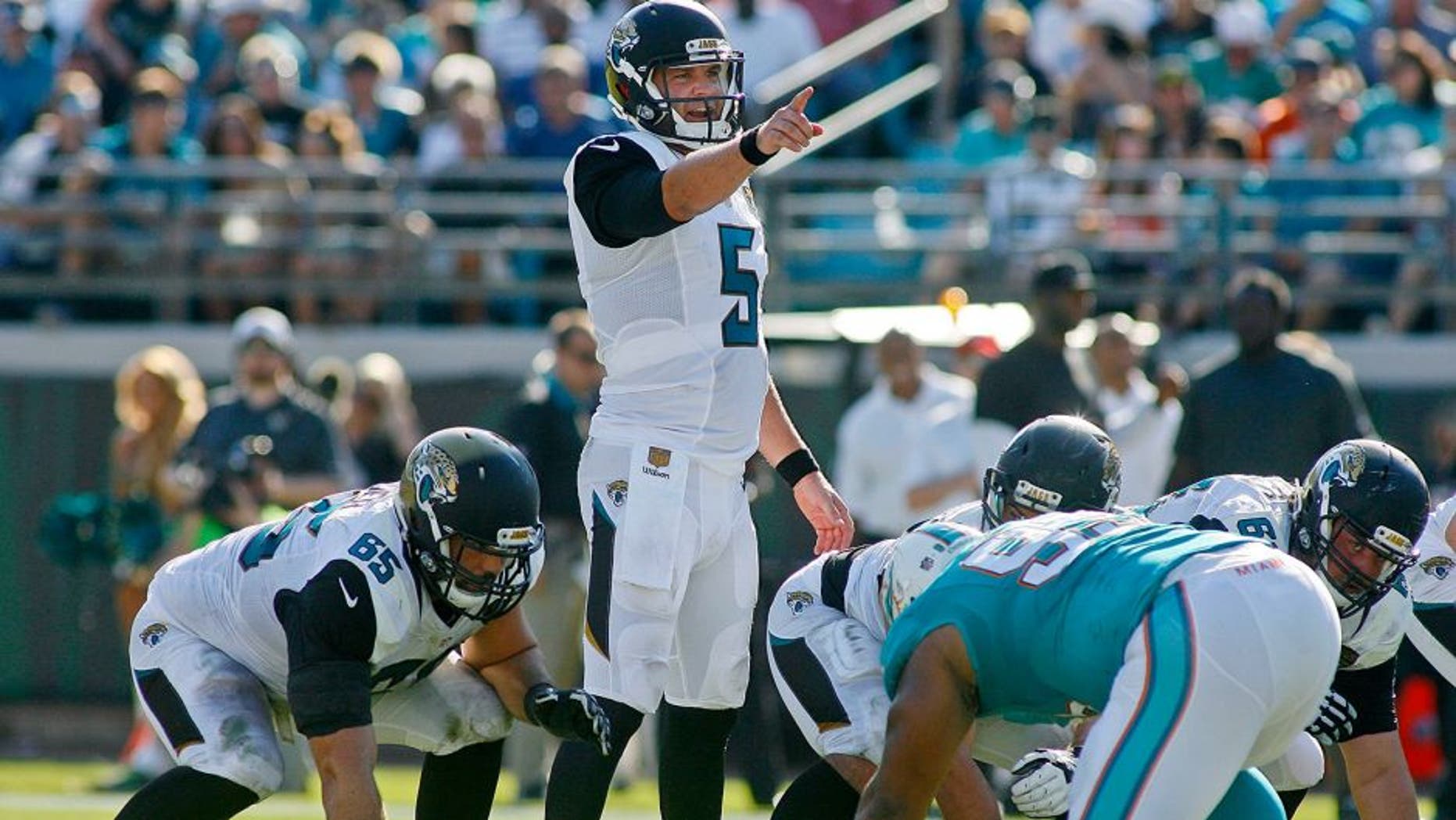 Sep 20, 2015; Jacksonville, FL, USA; Jacksonville Jaguars quarterback Blake Bortles (5) points at the line of scrimmage in the second quarter against the Miami Dolphins at EverBank Field. Mandatory Credit: Phil Sears-USA TODAY Sports