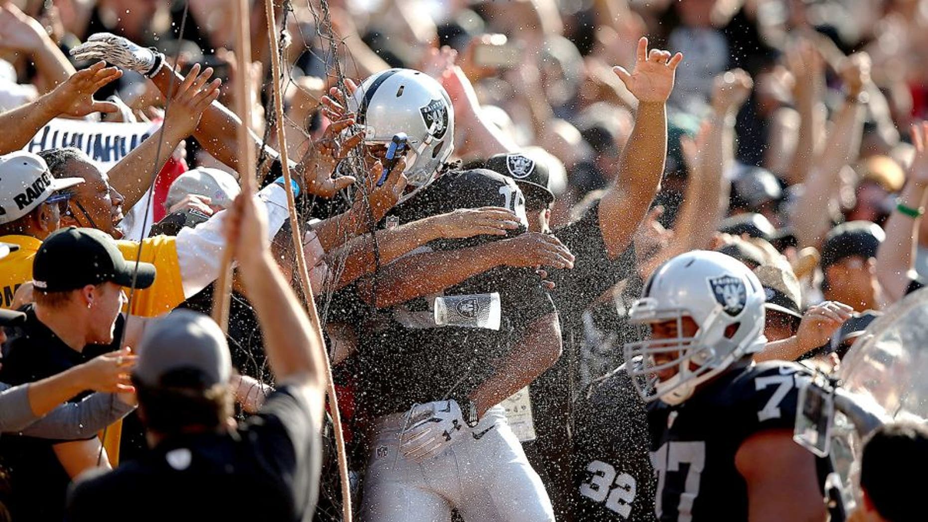OAKLAND, CA - SEPTEMBER 20: Seth Roberts #10 of the Oakland Raiders celebrates the game winning touchdown in the fourth quarter against the Baltimore Ravens at Oakland-Alameda County Coliseum on September 20, 2015 in Oakland, California. (Photo by Ezra Shaw/Getty Images)