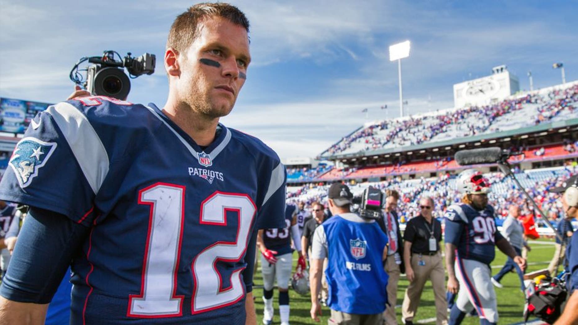 ORCHARD PARK, NY - SEPTEMBER 20: Tom Brady #12 of the New England Patriots walks off the field after the win against the Buffalo Bills on September 20, 2015 at Ralph Wilson Stadium in Orchard Park, New York. New England defeats Buffalo 40-32. (Photo by Brett Carlsen/Getty Images)