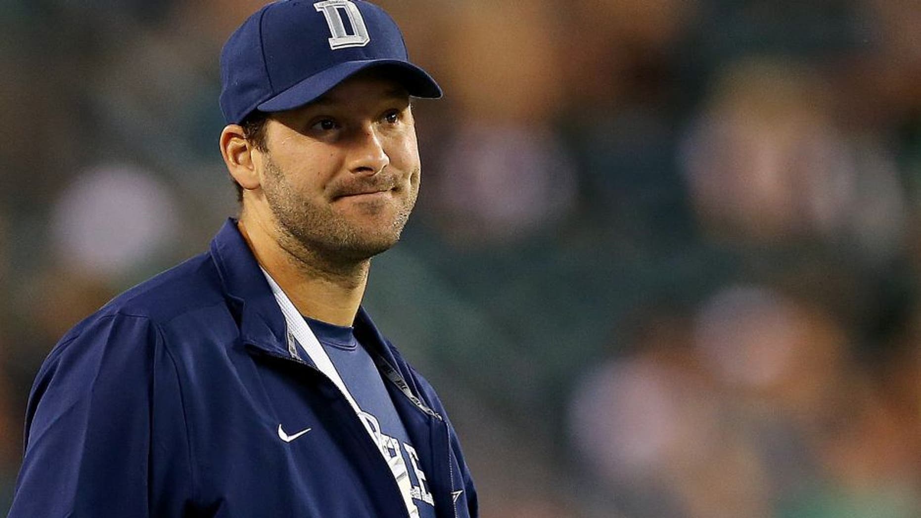 PHILADELPHIA, PA - SEPTEMBER 20: Tony Romo #9 of the Dallas Cowboys looks on from the sideline in the fourth quarter against the Philadelphia Eagles on September 20, 2014 at Lincoln Financial Field in Philadelphia, Pennsylvania.The Dallas Cowboys defeated the Philadelphia Eagles 20-10.Romo was injured in the third quarter and did not return to play. (Photo by Elsa/Getty Images)
