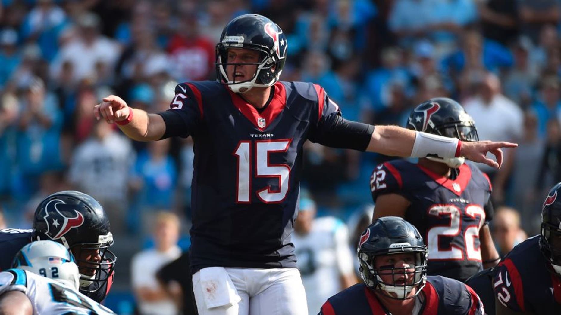 Sep 20, 2015; Charlotte, NC, USA; Houston Texans quarterback Ryan Mallett (15) signals in the fourth quarter. The Panthers defeated the Texans 24-17 at Bank of America Stadium. Mandatory Credit: Bob Donnan-USA TODAY Sports