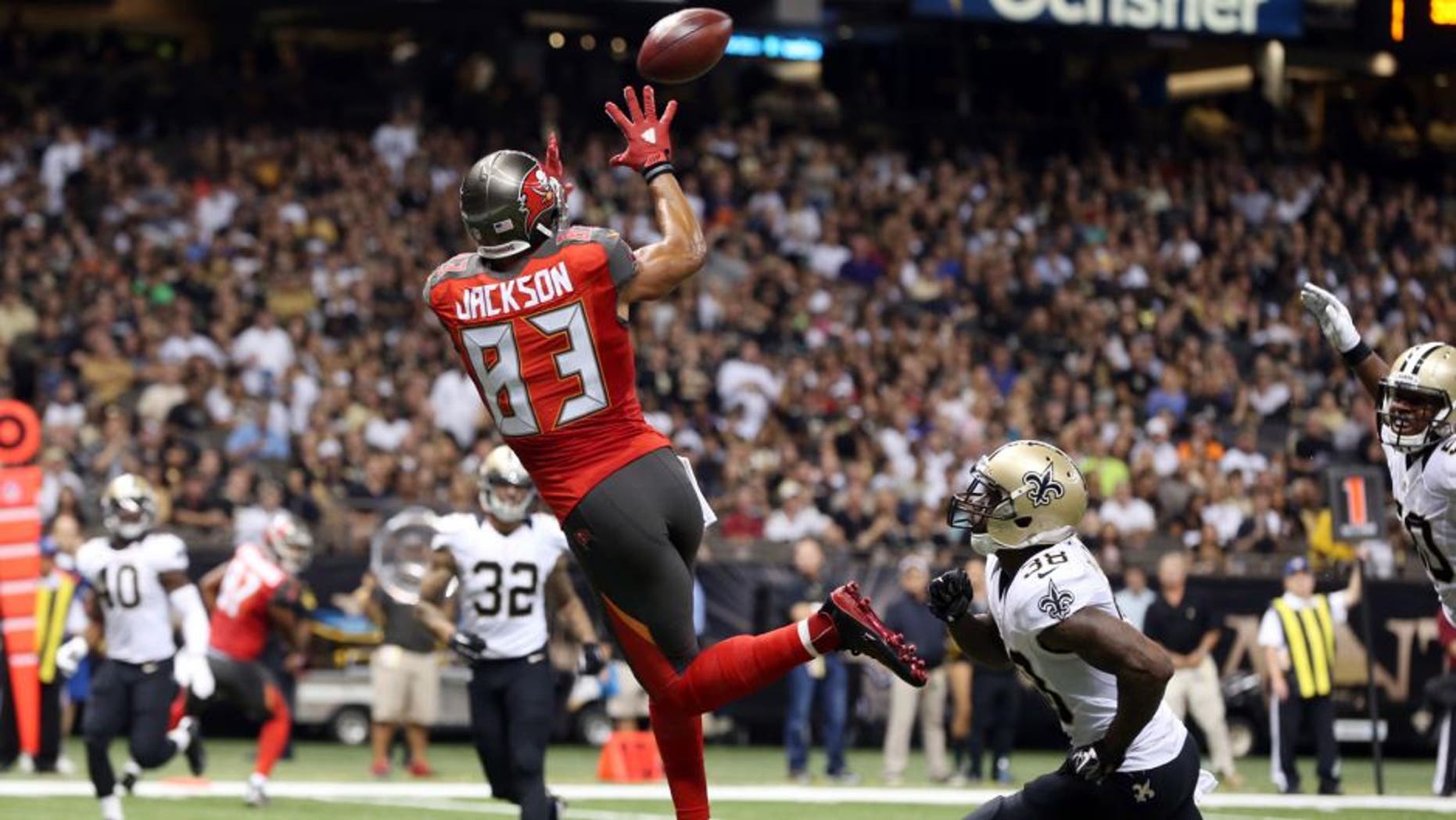Sep 20, 2015; New Orleans, LA, USA; Tampa Bay Buccaneers wide receiver Vincent Jackson (83) catches the ball to score a touchdown in the second quarter against the New Orleans Saints at the Mercedes-Benz Superdome. Mandatory Credit: Chuck Cook-USA TODAY Sports