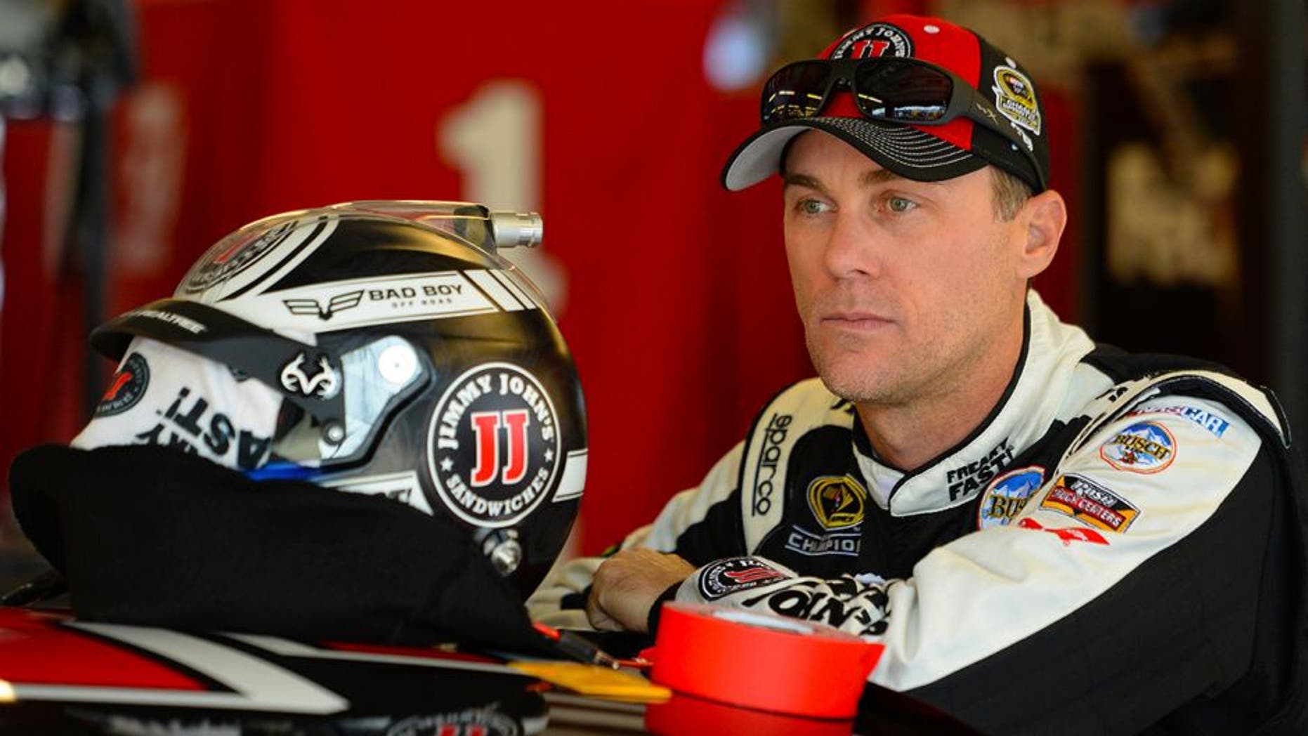 JOLIET, IL - SEPTEMBER 17: Kevin Harvick, driver of the #4 Jimmy John's Chevrolet, stands in the garage area during practice for the NASCAR Sprint Cup Series Teenage Mutant Ninja Turtles 400 at Chicagoland Speedway on September 17, 2016 in Joliet, Illinois. (Photo by Robert Laberge/Getty Images)