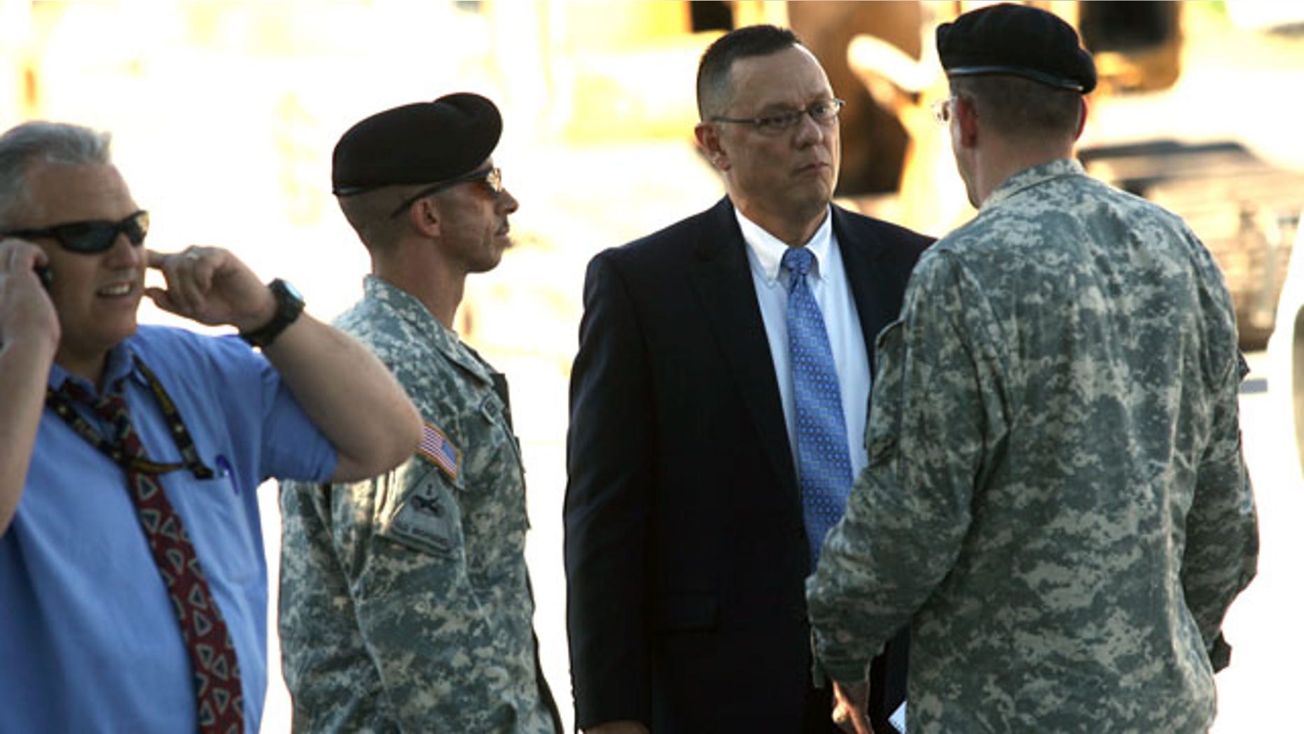 Sept. 20: Officials, including Fort Bliss Garrison Commander Col. Joseph Simonelli, right, conferred at the media center following a shooting Monday afternoon at Fort Bliss, Texas.