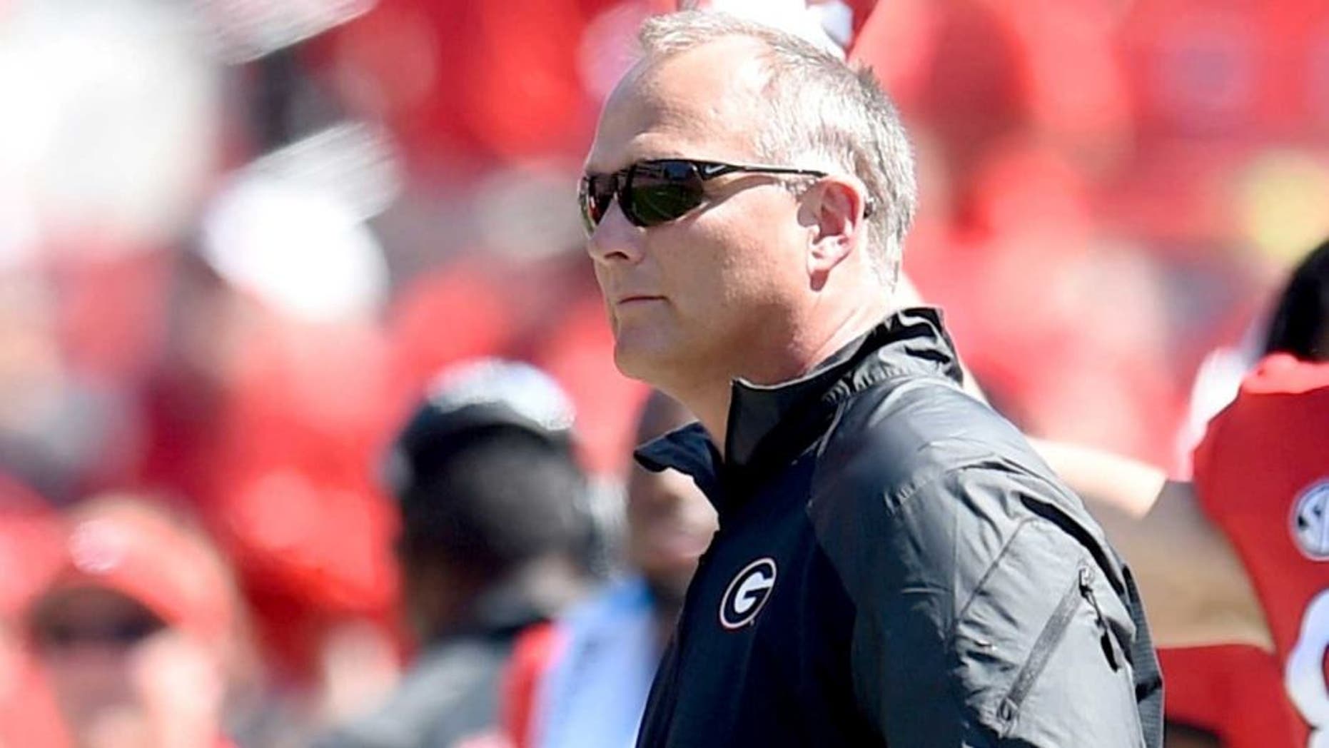 Sep 20, 2014; Athens, GA, USA; Georgia Bulldogs head coach Mark Richt coaches against the Troy Trojans during the second half at Sanford Stadium. Georgia defeated Troy 66-0. Mandatory Credit: Dale Zanine-USA TODAY Sports