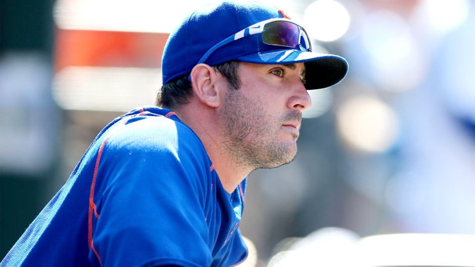 NEW YORK, NY - SEPTEMBER 19: Matt Harvey #33 of the New York Mets looks on from the dugout in the seventh inning against the New York Yankees during interleague play on September 19, 2015 at Citi Field in the Flushing neighborhood of the Queens borough of New York City. (Photo by Elsa/Getty Images)