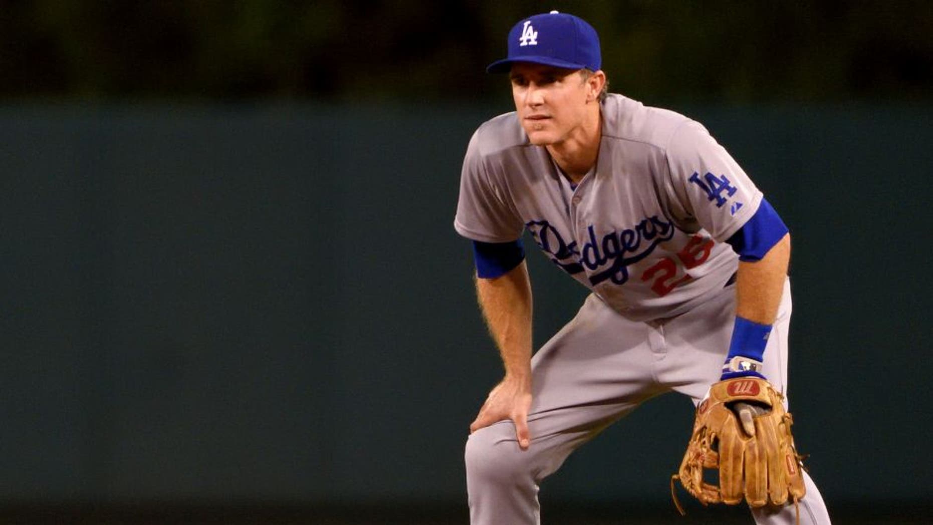 ANAHEIM, CA - SEPTEMBER 8: Chase Utley #26 of the Los Angeles Dodgers plays third base during the ninth inning of the game against the Los Angeles Angels of Anaheim at Angel Stadium of Anaheim on September 8, 2015 in Anaheim, California. (Photo by Matt Brown/Angels Baseball LP/Getty Images)