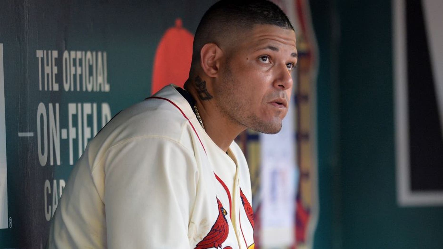 ST. LOUIS, MO - AUGUST 15: Yadier Molina #4 of the St. Louis Cardinals in the dugout during a game against the Miami Marlins at Busch Stadium on August 15, 2015 in St. Louis, Missouri. (Photo by Michael Thomas/Getty Images)