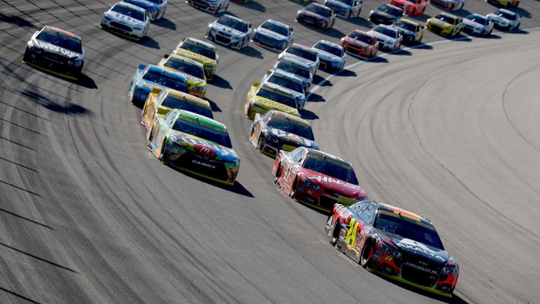 JOLIET, IL - SEPTEMBER 20: Jeff Gordon, driver of the #24 AXALTA Chevrolet, leads a pack of cars during the NASCAR Sprint Cup Series myAFibRisk.com 400 at Chicagoland Speedway on September 20, 2015 in Joliet, Illinois. (Photo by Todd Warshaw/NASCAR via Getty Images)