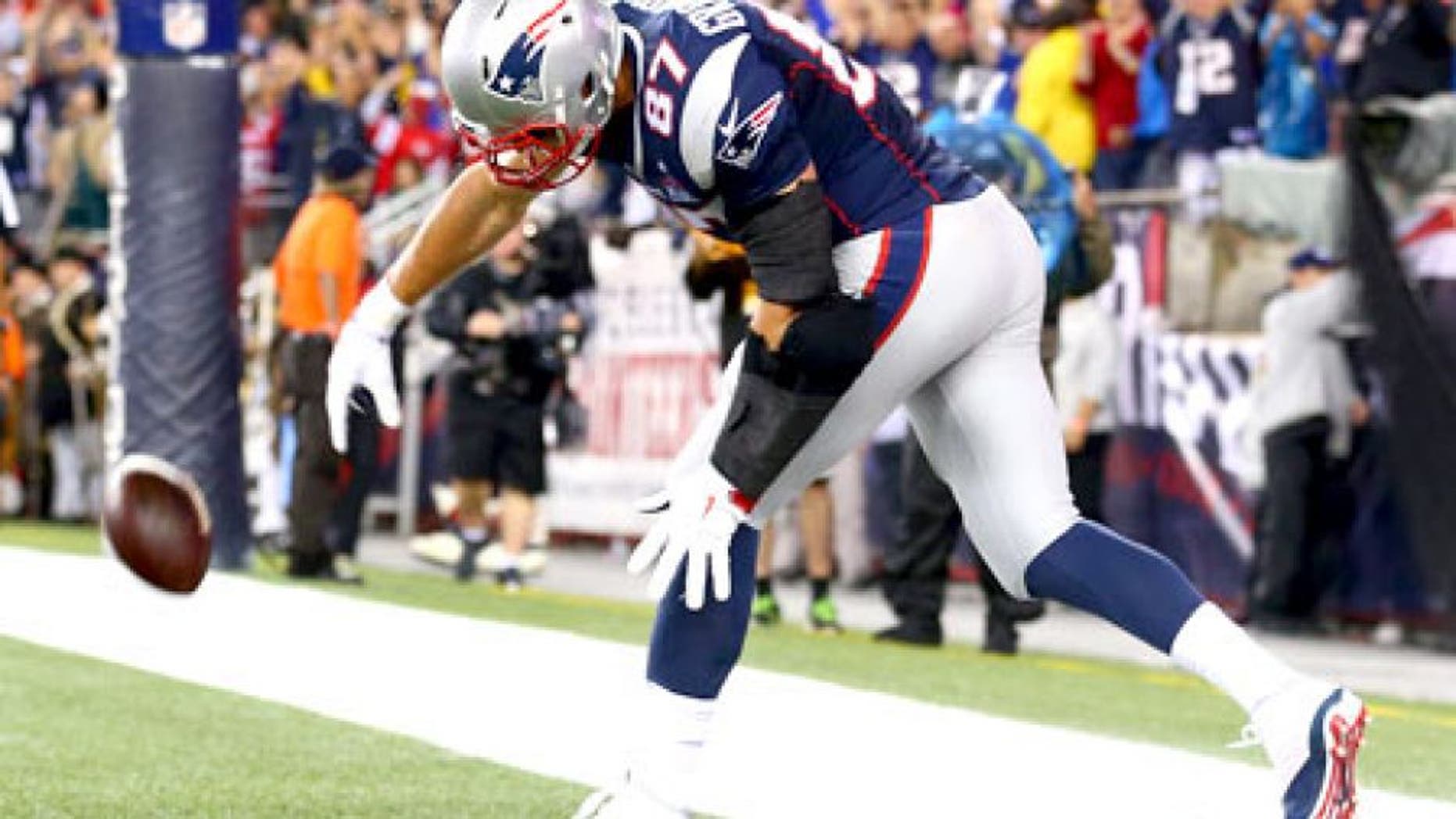 FOXBORO, MA - SEPTEMBER 10: Rob Gronkowski #87 of the New England Patriots spikes the ball to celebrate his touchdown in the second quarter against the Pittsburgh Steelers at Gillette Stadium on September 10, 2015 in Foxboro, Massachusetts. (Photo by Maddie Meyer/Getty Images)