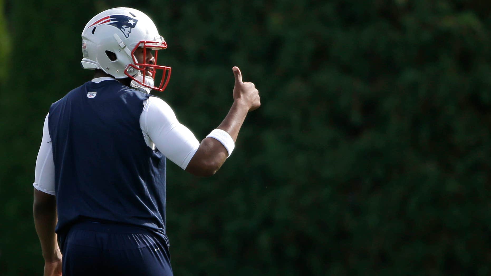 New England Patriots quarterback Jacoby Brissett gives a thumbs up during an NFL football team practice Tuesday, Sept. 20, 2016, in Foxborough, Mass.
