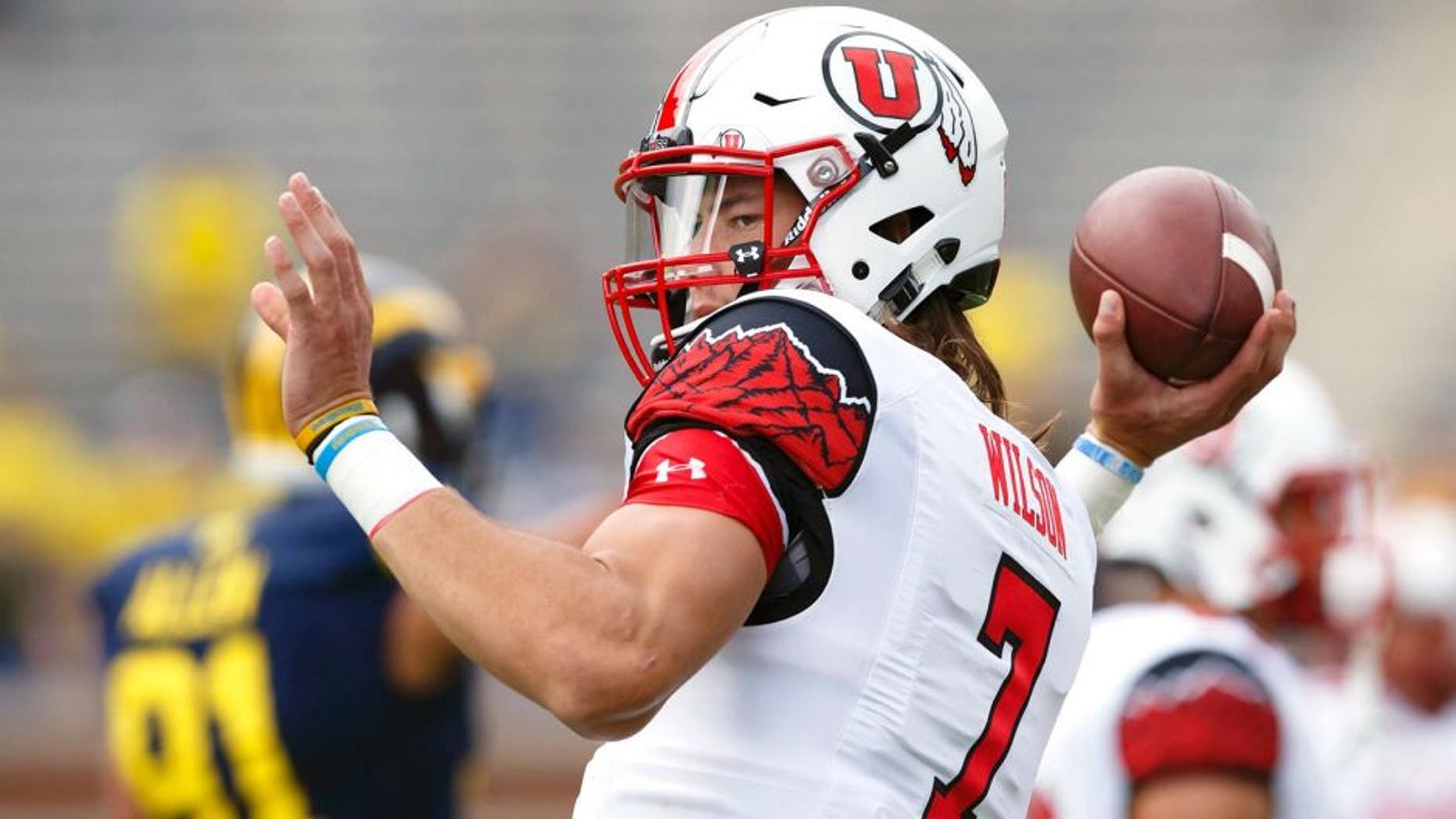 Sep 20, 2014; Ann Arbor, MI, USA; Utah Utes quarterback Travis Wilson (7) warms up before the game against the Michigan Wolverines at Michigan Stadium. Mandatory Credit: Rick Osentoski-USA TODAY Sports