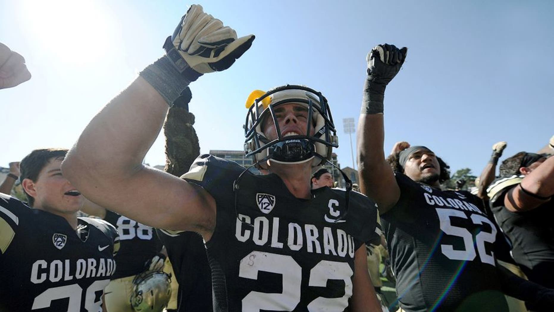 Sep 20, 2014; Boulder, CO, USA; Colorado Buffaloes wide receiver Nelson Spruce (22) celebrates the win over the Hawaii Warriors at Folsom Field. The Buffaloes defeated the Warriors 21-12. Mandatory Credit: Ron Chenoy-USA TODAY Sports