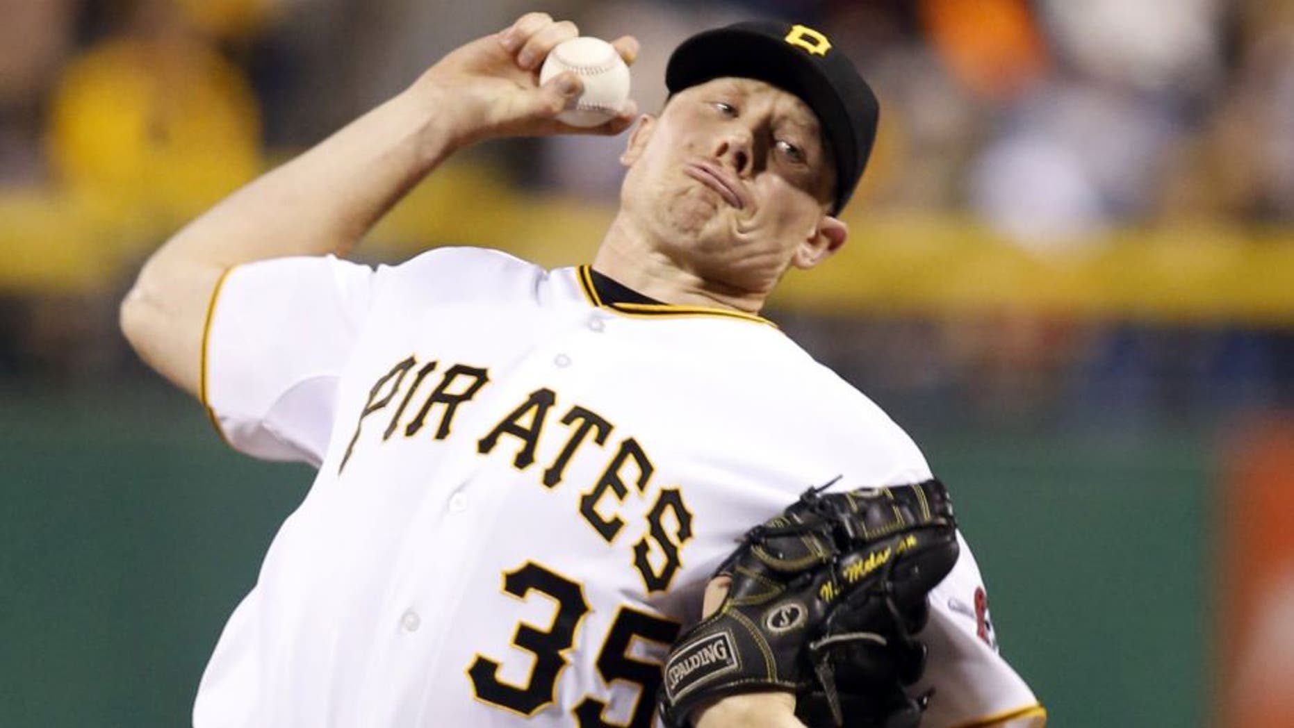 Sep 18, 2014; Pittsburgh, PA, USA; Pittsburgh Pirates relief pitcher Mark Melancon (35) pitches against the Boston Red Sox during the ninth inning at PNC Park. The Pirates won 3-2. Mandatory Credit: Charles LeClaire-USA TODAY Sports