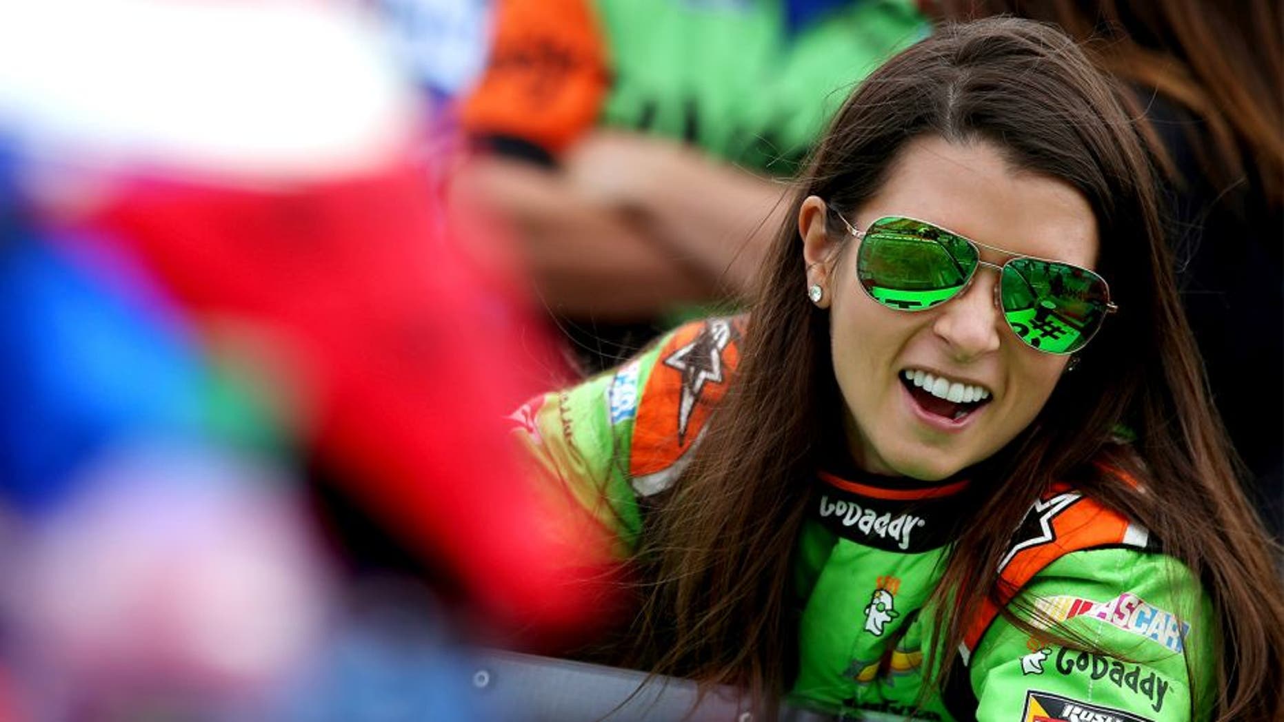 WATKINS GLEN, NY - AUGUST 08: Danica Patrick, driver of the #10 GoDaddy Chevrolet, stands on the grid during qualifying for the NASCAR Sprint Cup Series Cheez-It 355 at Watkins Glen International on August 8, 2015 in Watkins Glen, New York. (Photo by Sean Gardner/NASCAR via Getty Images)