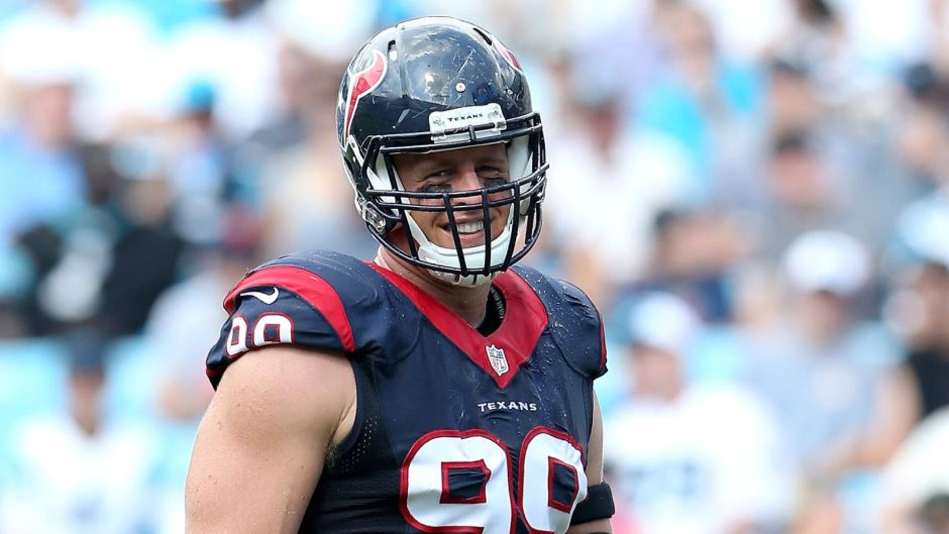 CHARLOTTE, NC - SEPTEMBER 20: J.J. Watt #99 of the Houston Texans looks to the sideline in the second half against the Carolina Panthers during their game at Bank of America Stadium on September 20, 2015 in Charlotte, North Carolina. (Photo by Streeter Lecka/Getty Images)