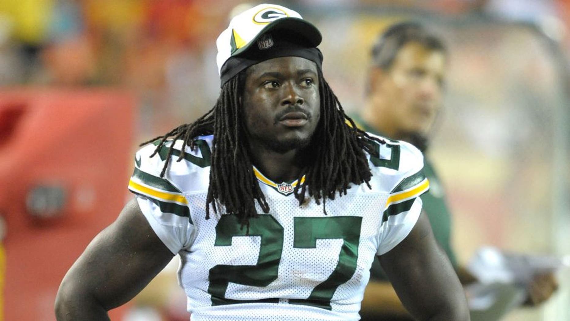 Aug 29, 2013; Kansas City, MO, USA; Green Bay Packers running back Eddie Lacy (27) watches play on the sidelines during the second half of the game against the Kansas City Chiefs at Arrowhead Stadium. The Chiefs won 30-8. Mandatory Credit: Denny Medley-USA TODAY Sports