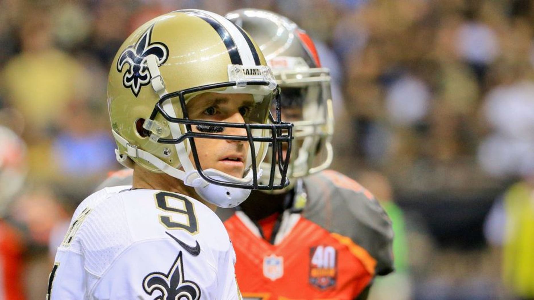 Sep 20, 2015; New Orleans, LA, USA; New Orleans Saints quarterback Drew Brees (9) against the Tampa Bay Buccaneers during the second half of a game at the Mercedes-Benz Superdome. The Buccaneers won 26-19. Mandatory Credit: Derick E. Hingle-USA TODAY Sports